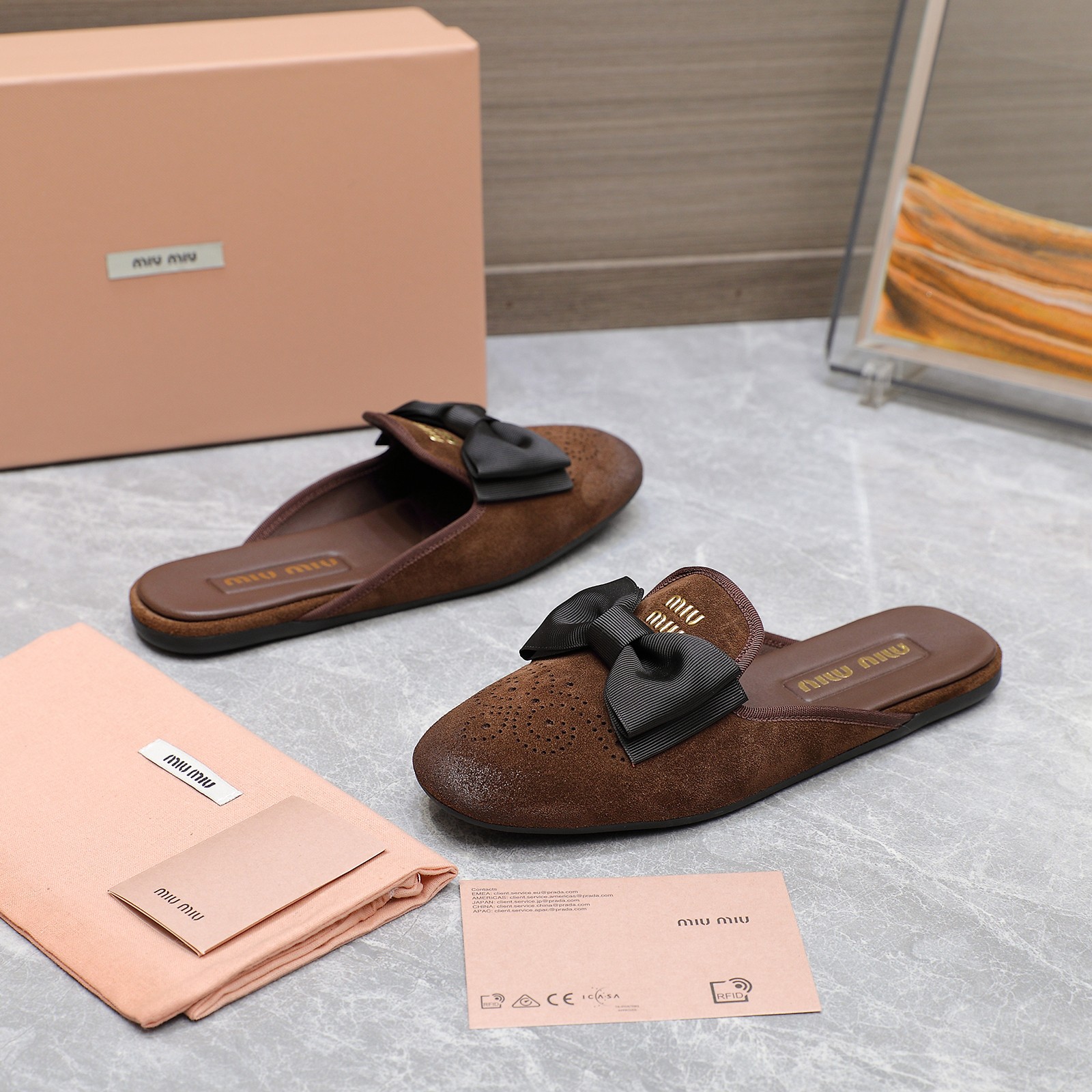 Miu Miu Bow-Embellished Suede Loafer Mules: Elegant and Comfortable 9 a1736428829104 2438