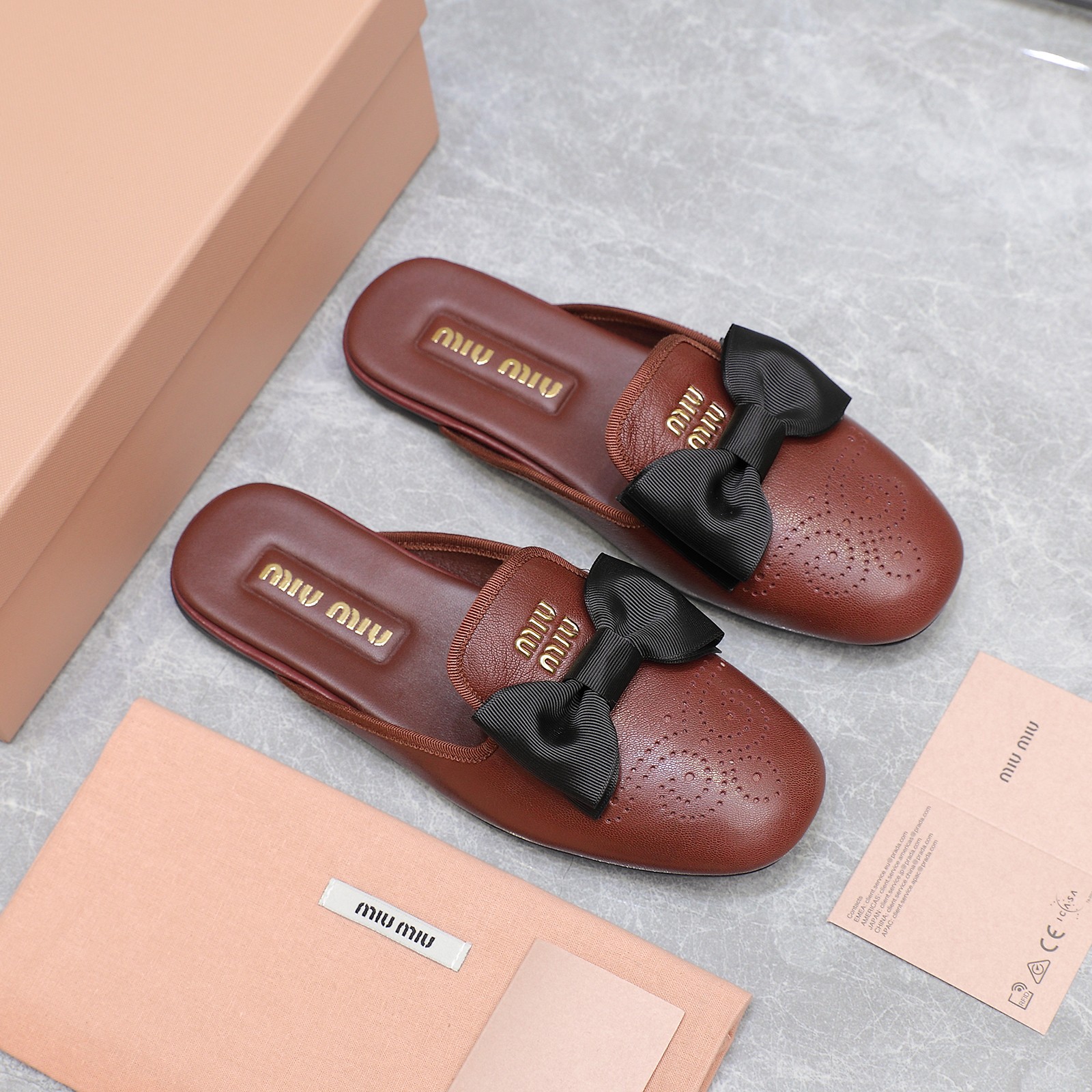 Miu Miu Bow-Embellished Perforated Leather Loafer Mules