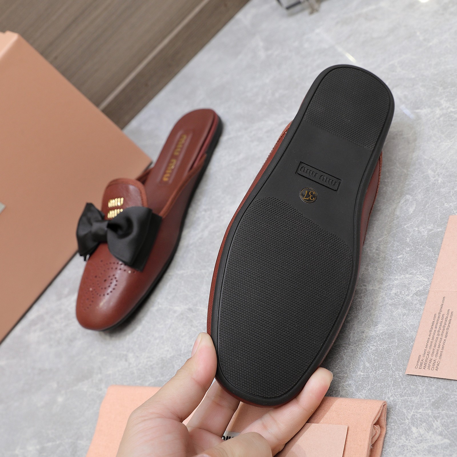 Miu Miu Bow-Embellished Perforated Leather Loafer Mules 10 a1736428856698 2447