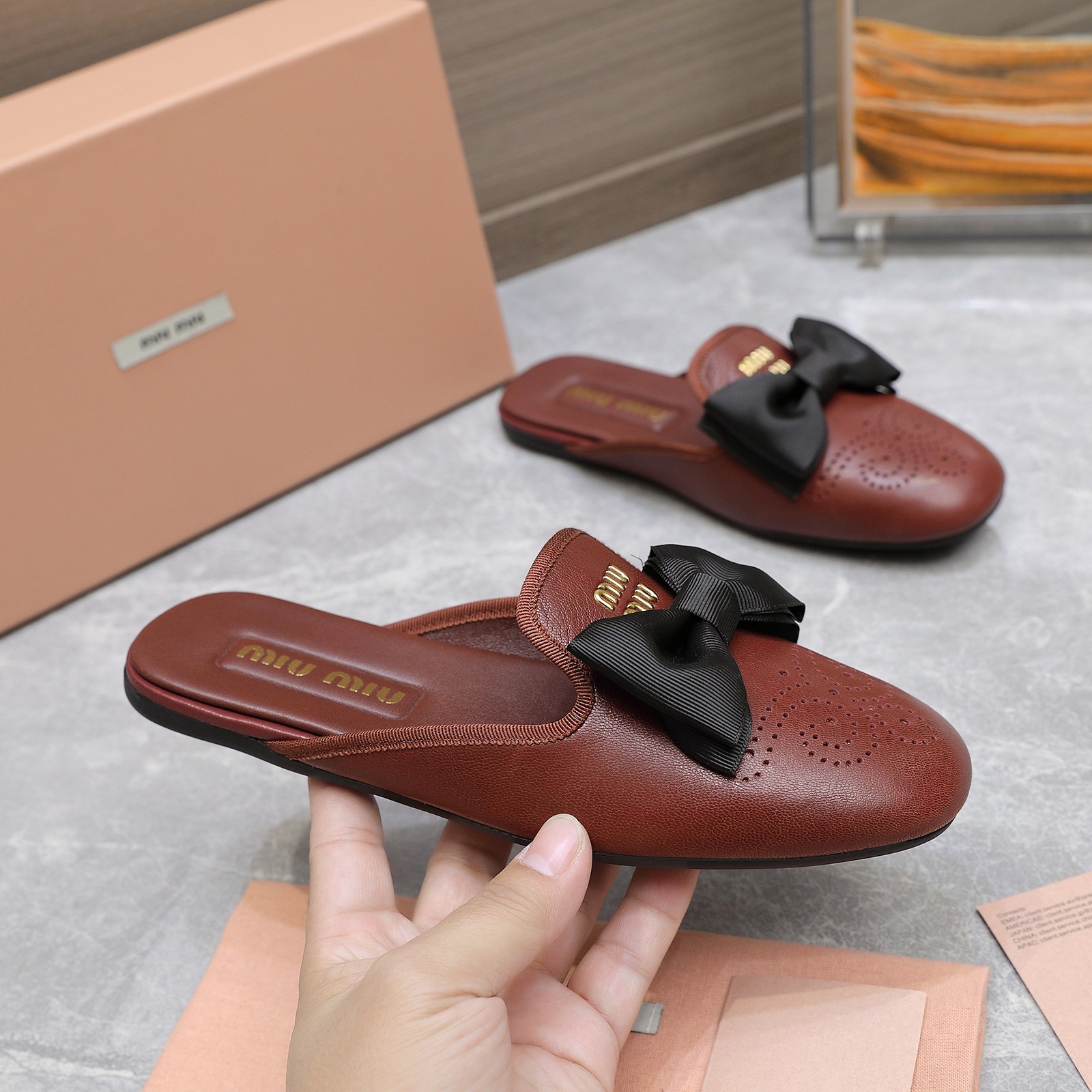 Miu Miu Bow-Embellished Perforated Leather Loafer Mules 3 a1736428856725 3607