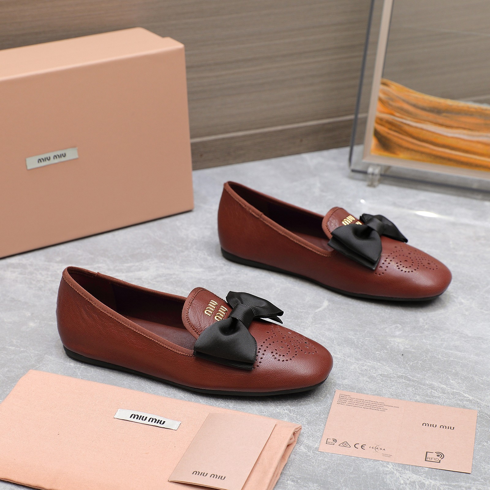 Miu Miu Bow-Embellished Perforated Leather Loafers Ballet Flats 4 a1736429156818 6756