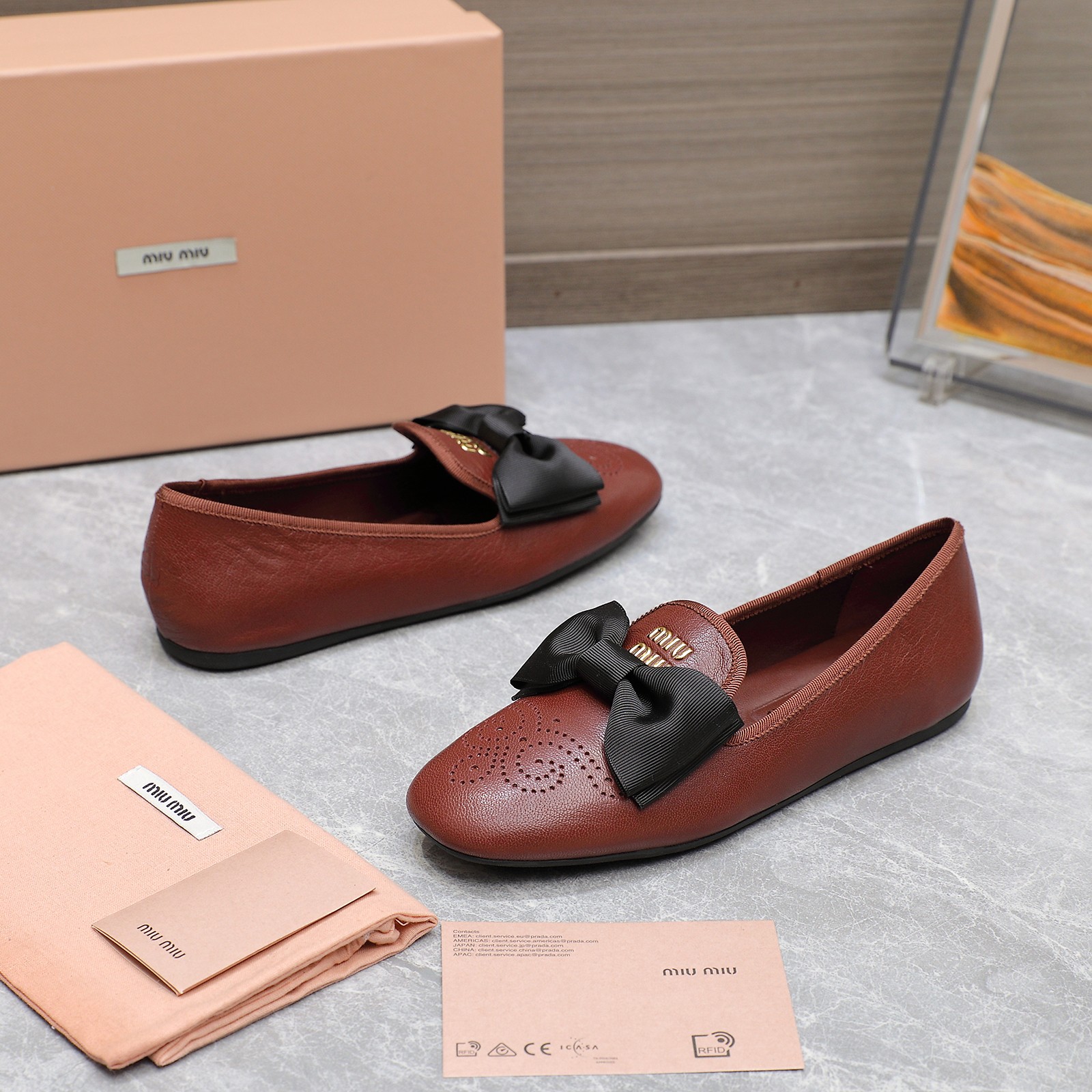 Miu Miu Bow-Embellished Perforated Leather Loafers Ballet Flats 5 a1736429156897 2201