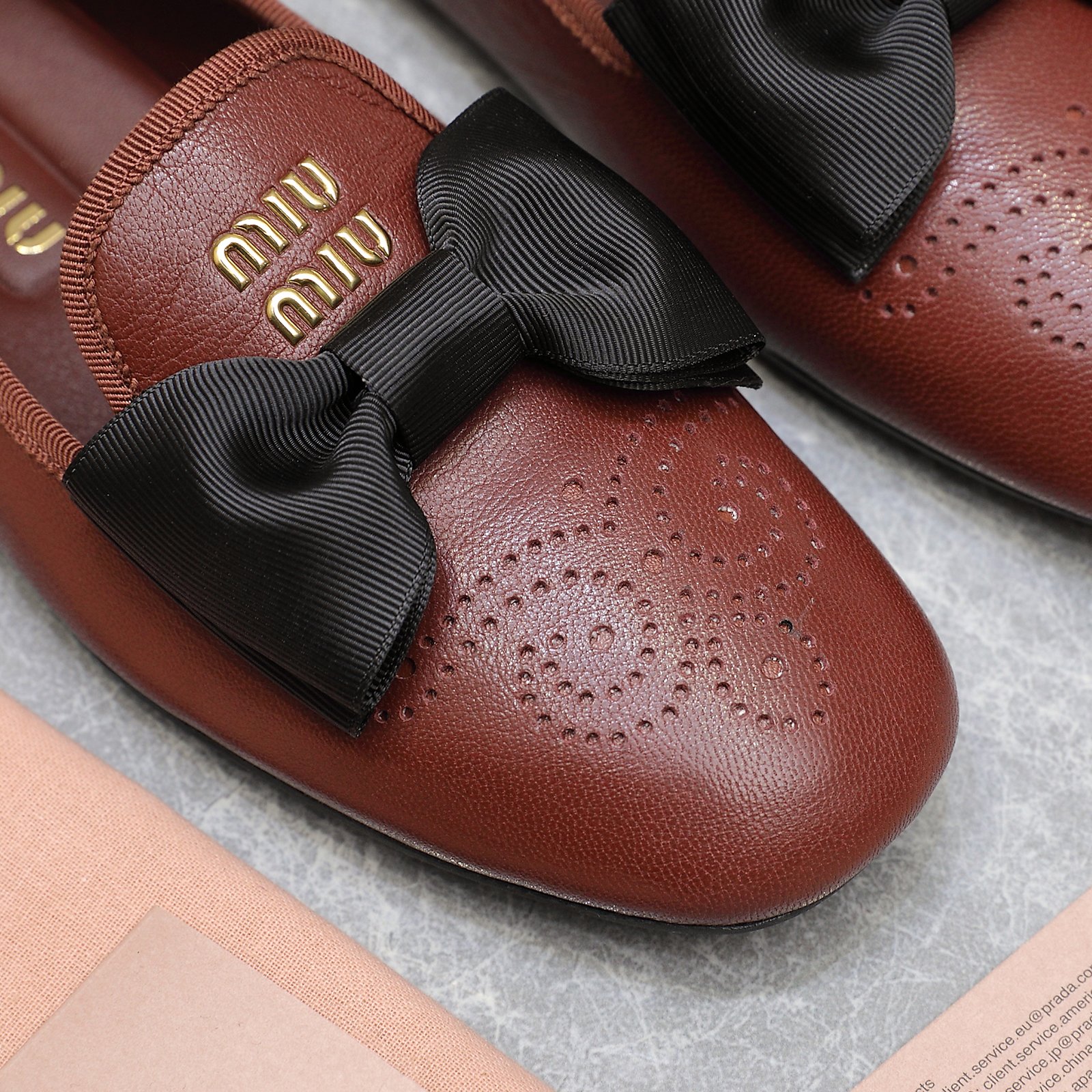 Miu Miu Bow-Embellished Perforated Leather Loafers Ballet Flats 6 a1736429156919 6230