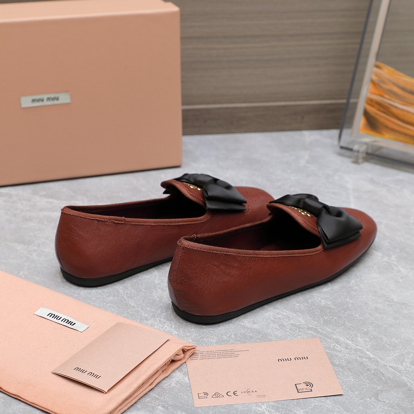 Miu Miu Bow-Embellished Perforated Leather Loafers Ballet Flats 10 a1736429158643 3515