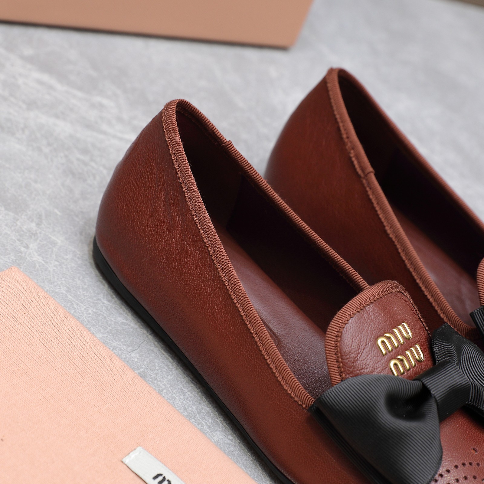 Miu Miu Bow-Embellished Perforated Leather Loafers Ballet Flats 9 a1736429158649 1063