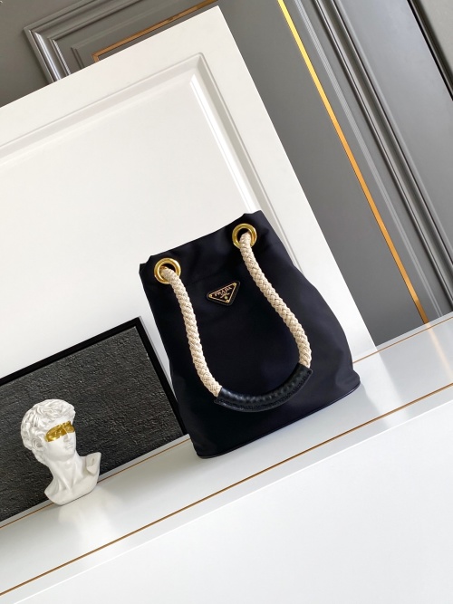 Prada Black Re-Nylon Bucket Bag with Rope Handle and Enamel Triangle Logo 1 Prada Black Re-Nylon Bucket Bag with Rope Handle and Enamel Triangle Logo