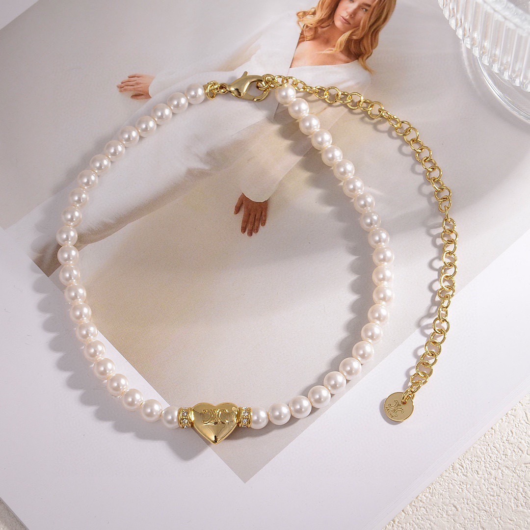 Celine PRECIOUS Heart Pearl bracelet gold-tone metal white pearl clear crystal accents 18cm with 5cm extender chain
