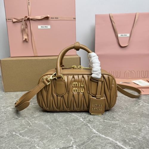 Miu Miu Bowling Bag in Matelassé Leather with Shoulder Strap - Stylish & Chic 1 Miu Miu Bowling Bag in Matelassé Leather with Shoulder Strap - Stylish & Chic