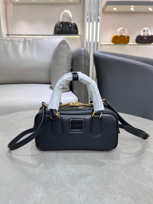 Miu Miu Bowling Bag in Black Leather with Matelassé Pattern, 22x10.5x7.5 cm 1 Miu Miu Bowling Bag in Black Leather with Matelassé Pattern, 22x10.5x7.5 cm