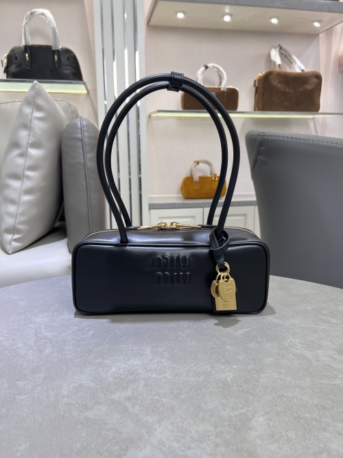 Miu Miu Beau Handbag in Black Leather with Gold Hardware - Chic & Compact 1 Miu Miu Beau Handbag in Black Leather with Gold Hardware - Chic & Compact