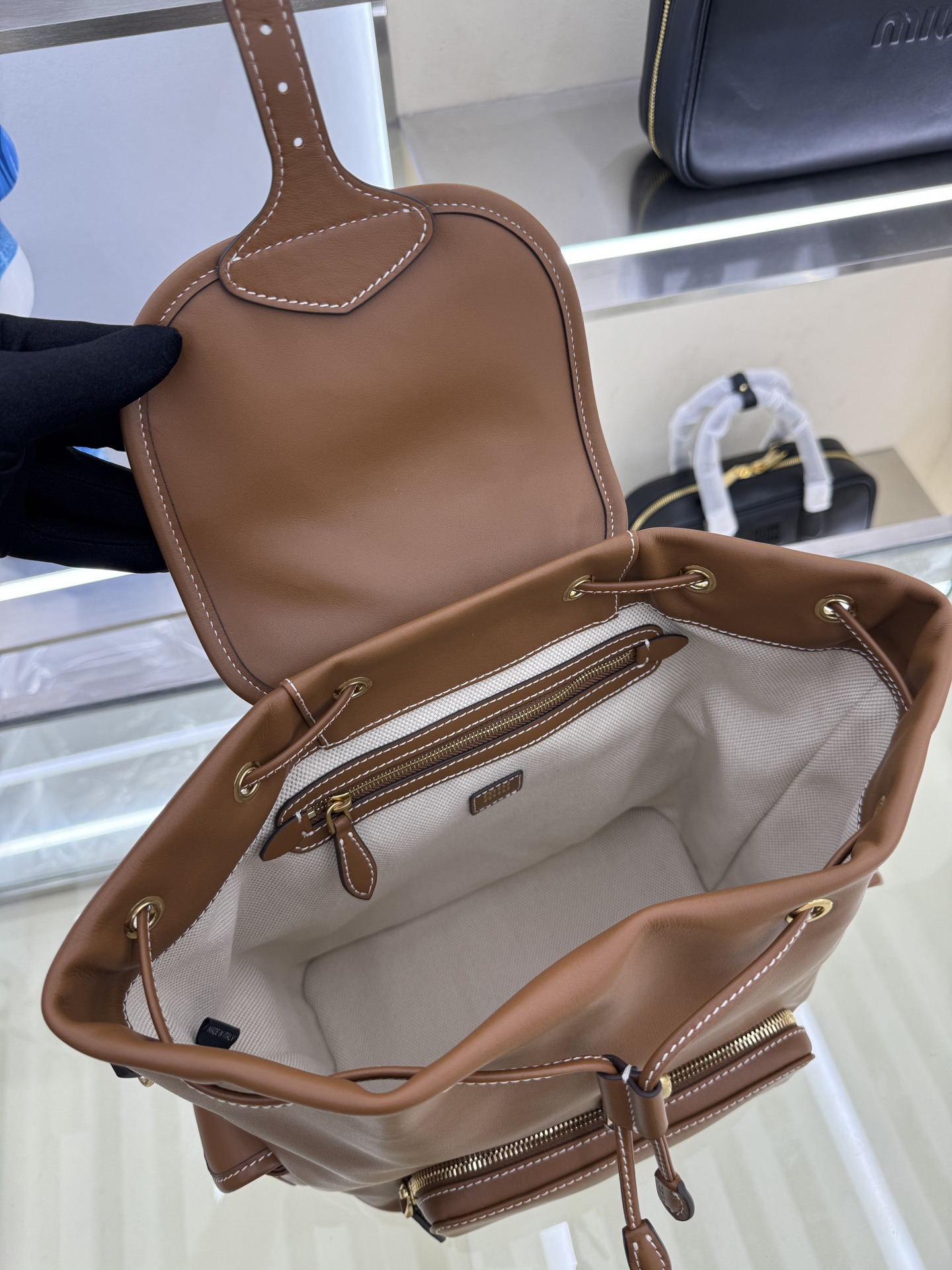 Miu Miu Leather Backpack Rucksack with Multiple Pockets - Stylish & Functional 9 i1754123828778 2191 0 7