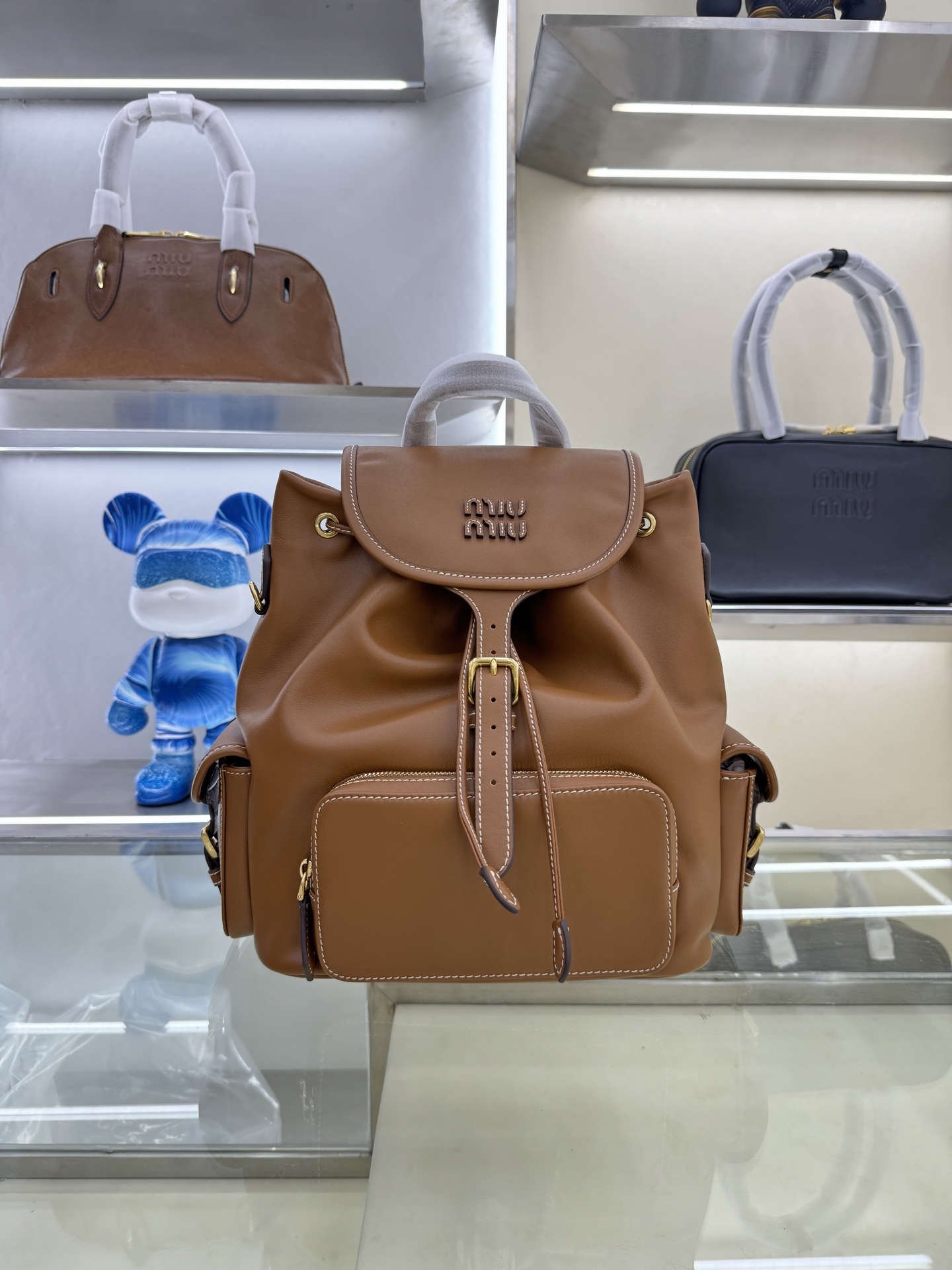 Miu Miu Leather Backpack Rucksack with Multiple Pockets - Stylish & Functional 2 i1754123831885 6046 0 1
