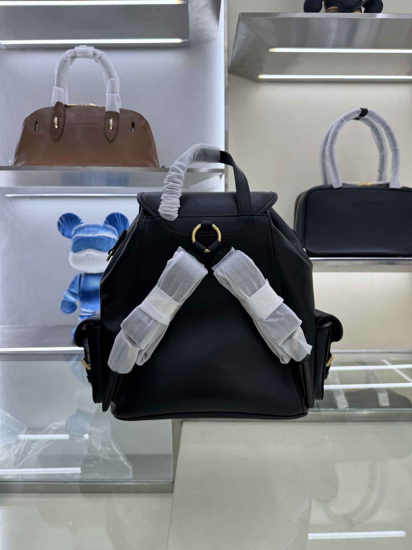 Miu Miu Campus Style Backpack: Canvas & Leather, Stylish & Functional 3 i1754123973002 2636 0 1
