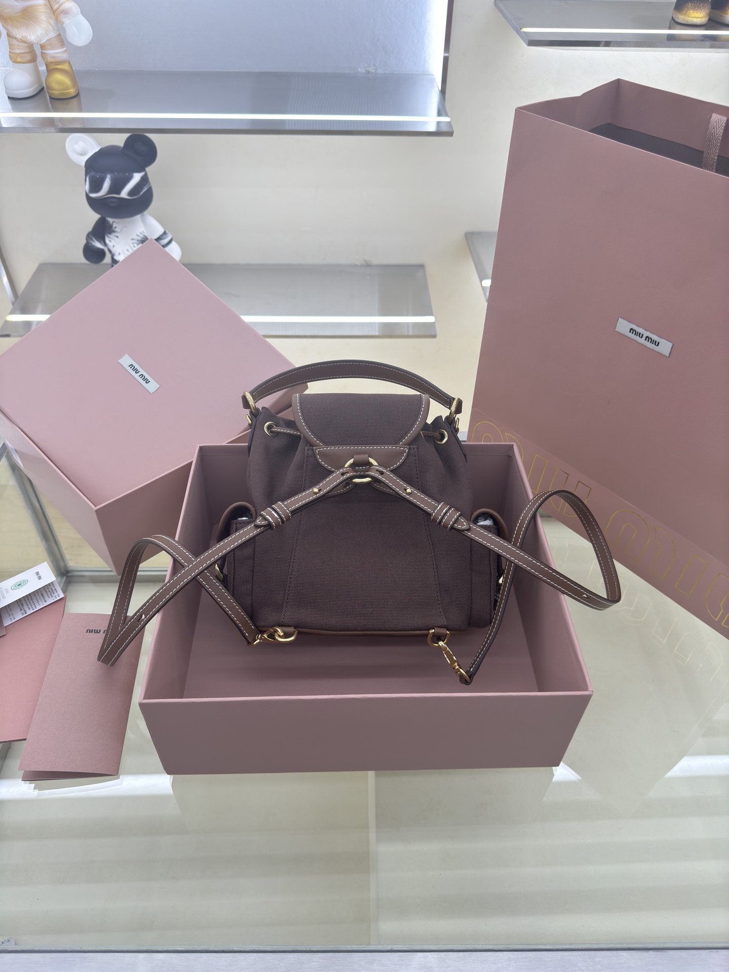 Miu Miu Small Brown Canvas and Leather Backpack Rucksack 5BZ043 3 i1756489472090 6495 0 1