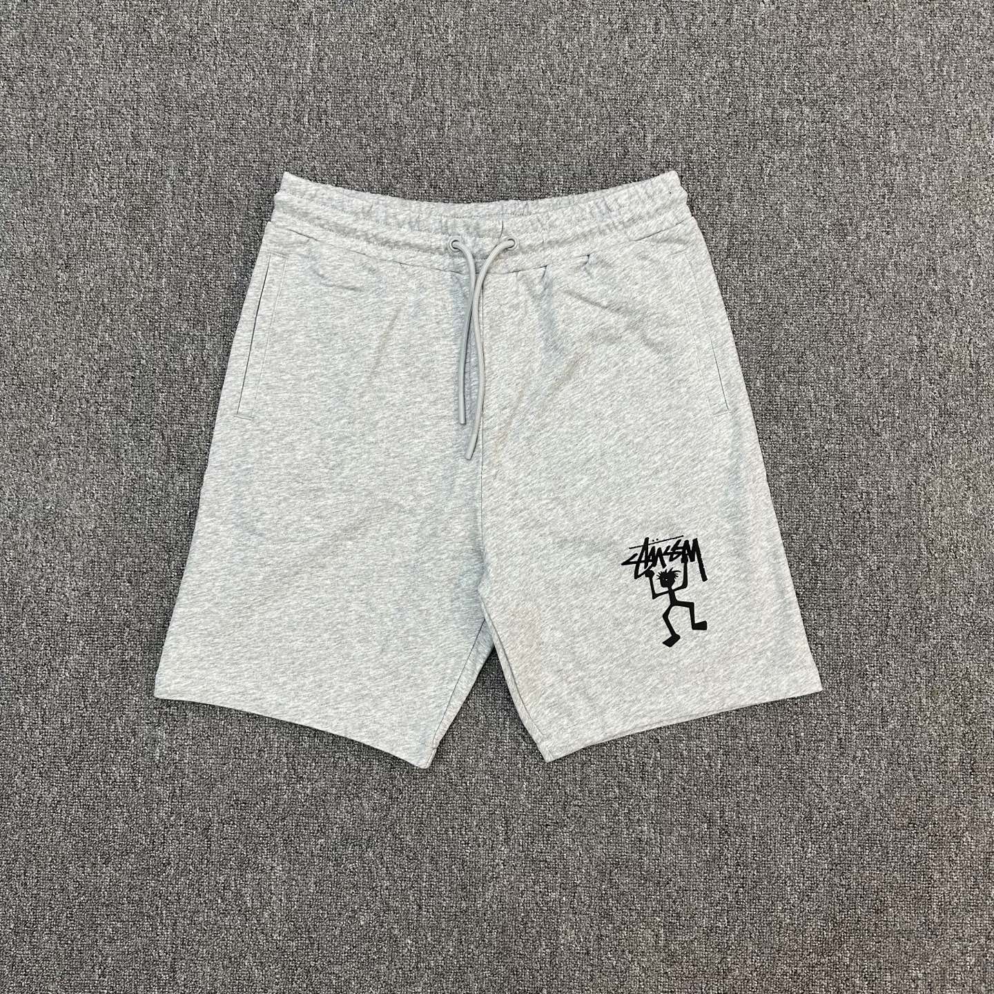 P110 XX200 Stussy color liso con estampado de levantamiento de pesas, pantalones cortos holgados de tela de r…