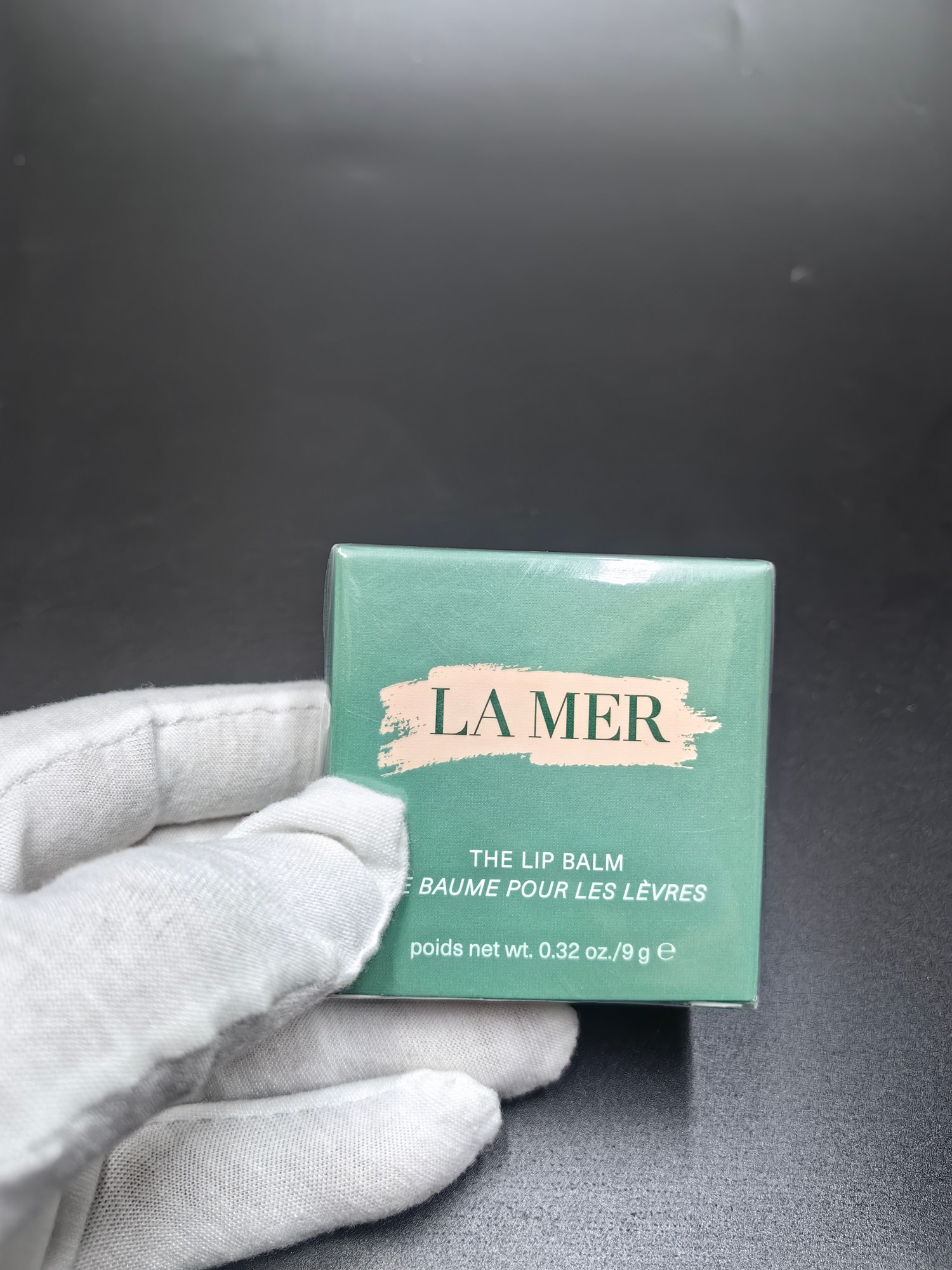 明通海蓝之谜唇膜9g LOGO带烫银 膏体灌装细节完整 膏体对版对味 带功效 薄荷味 搭配中文标 打50个 件100个 认准打码:YA4