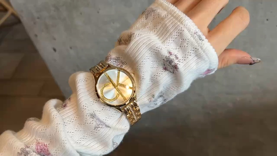 Calvin Klein Women's Gold-Tone Bracelet Watch with Mother of Pearl Dial 1 Calvin Klein Women's Gold-Tone Bracelet Watch with Mother of Pearl Dial
