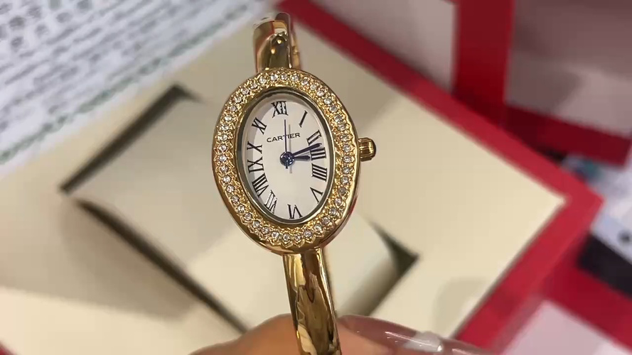 Cartier Baignoire Gold Bracelet Watch Diamond-Set Bezel Elegant Design 1 Cartier Baignoire Gold Bracelet Watch Diamond-Set Bezel Elegant Design
