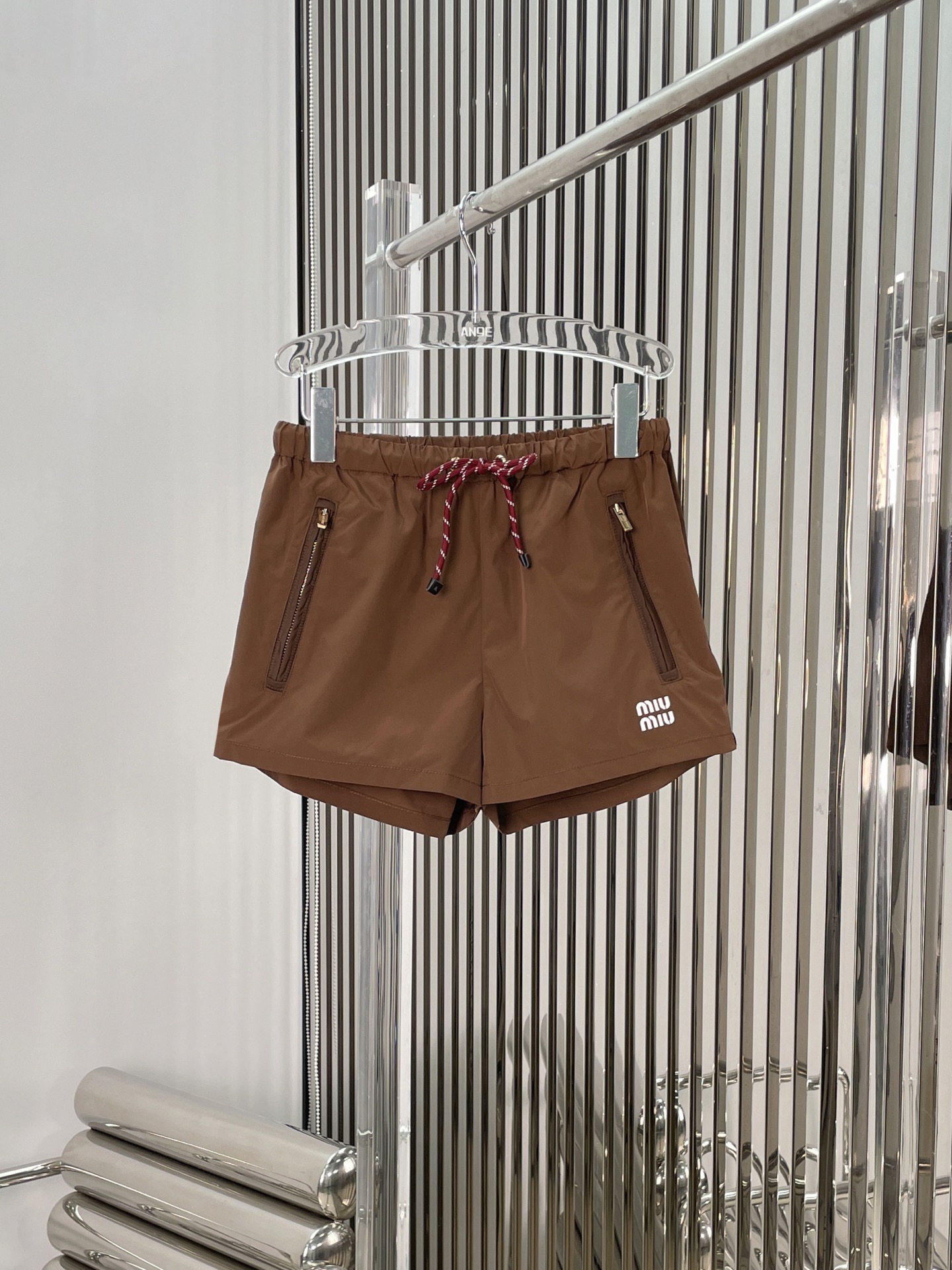NO:317317,[Love] New [Love]!  Latest MIU 25NEW Coffee nylon hooded jacket   shorts. Size SML.,,miumiu, shorts, jackets & coats,hats,alexander wang19860909[爱心]新款[爱心]！最新MIU 25NEW 咖啡色尼龙连帽外套 短裤.尺码SML.,,miumiu,shorts,jackets & coats,hats,alexander wang,Women's clothing