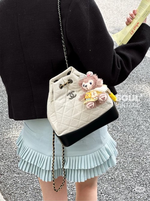 Chanel White & Black Leather Quilted Drawstring Backpack,Stylish and Versatile 1 Chanel White & Black Leather Quilted Drawstring Backpack,Stylish and Versatile