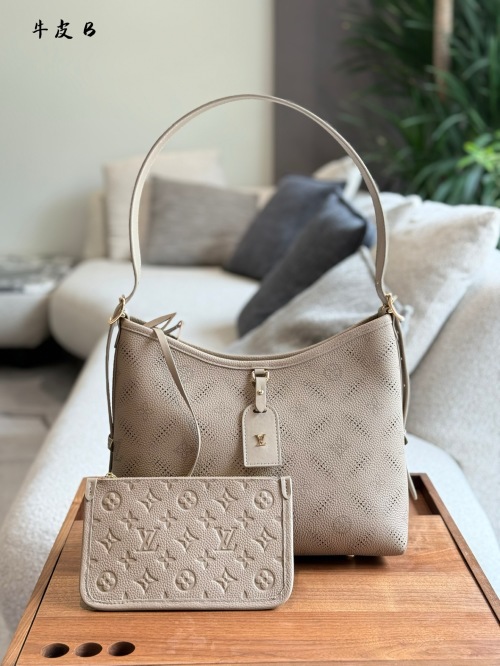 Bolso Carryall Louis Vuitton en Cuero con Monograma en Relieve 1 Bolso Carryall Louis Vuitton en Cuero con Monograma en Relieve
