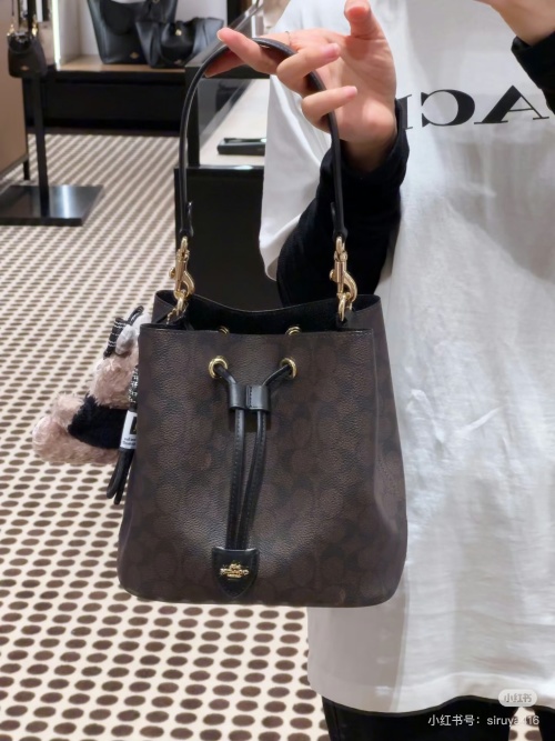 Coach Rowan Bucket Bag in Signature Canvas With Zip Pouch 1 Coach Rowan Bucket Bag in Signature Canvas With Zip Pouch