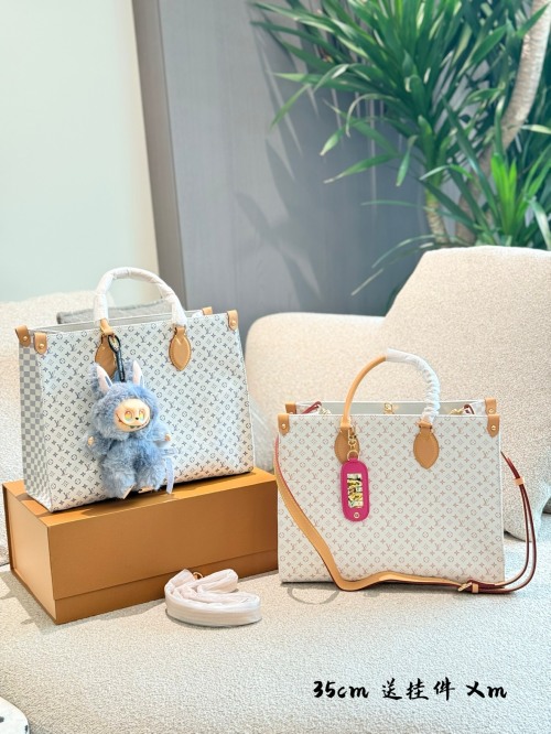 Louis Vuitton OnTheGo PM Bolso Tote de Cuero con Adorno de Equipaje 1 Louis Vuitton OnTheGo PM Bolso Tote de Cuero con Adorno de Equipaje