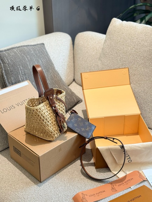 Louis Vuitton Summer Raffia Woven Bucket Bag with Leather Accents 1 Louis Vuitton Summer Raffia Woven Bucket Bag with Leather Accents