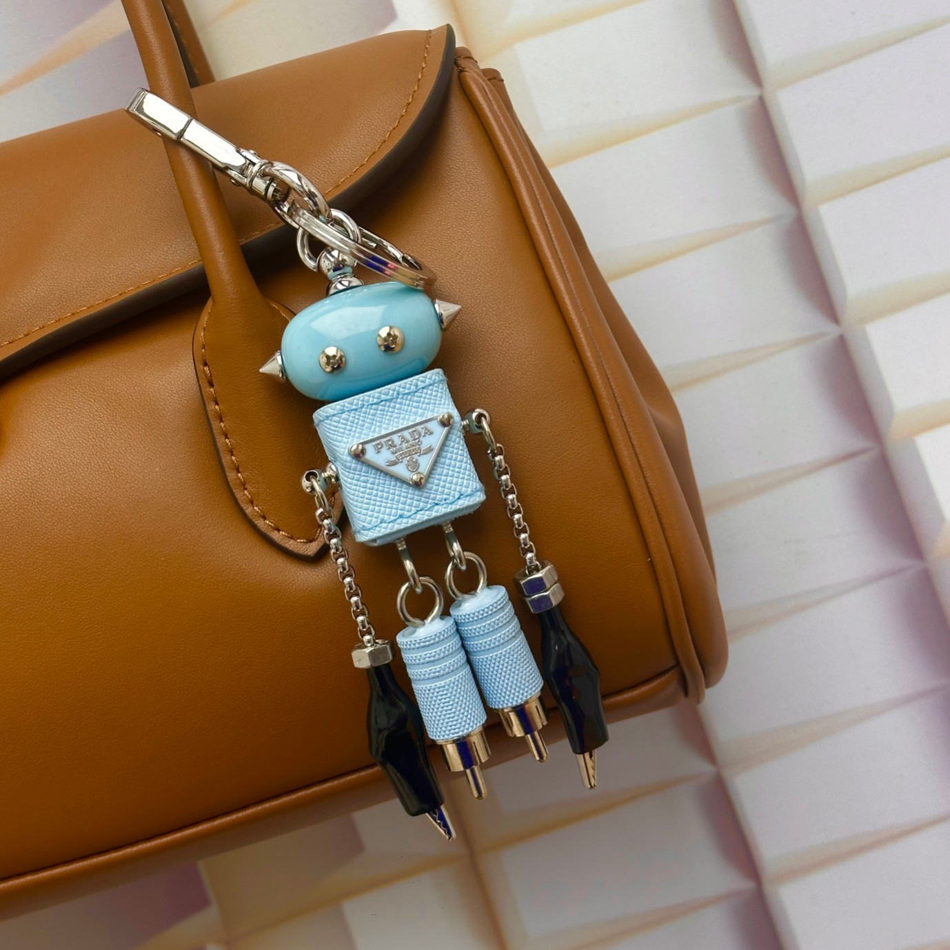 Prada Saffiano leather handbag charm front view