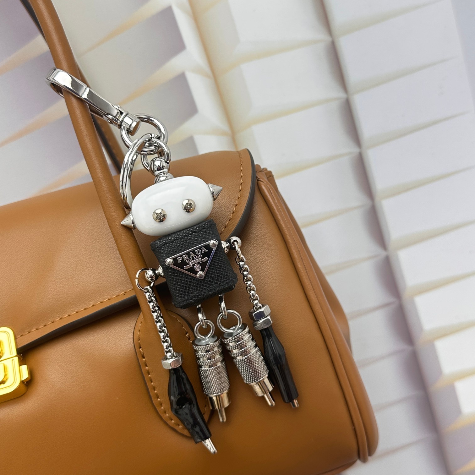 Prada Saffiano leather handbag charm front view