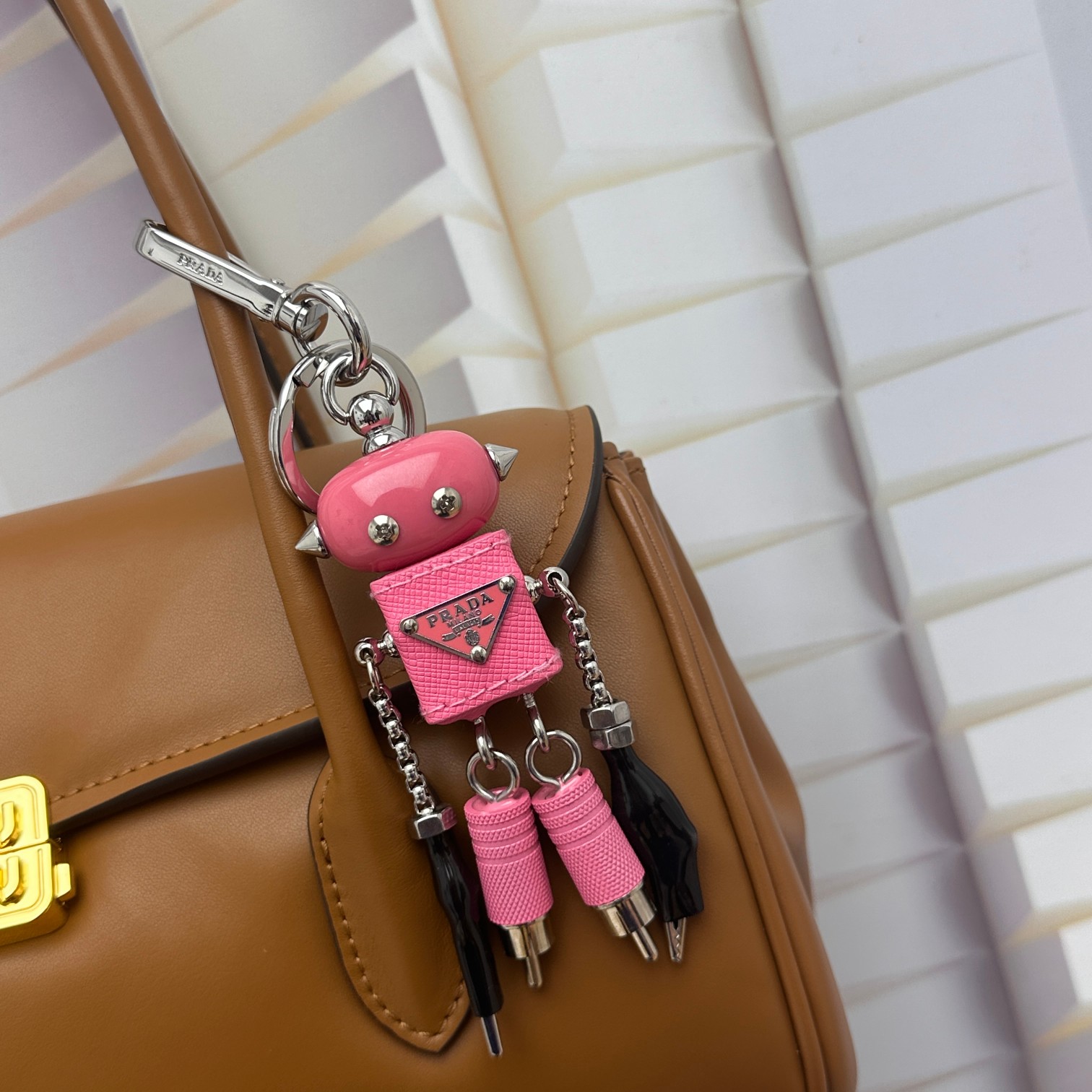 Prada Saffiano leather handbag charm front view