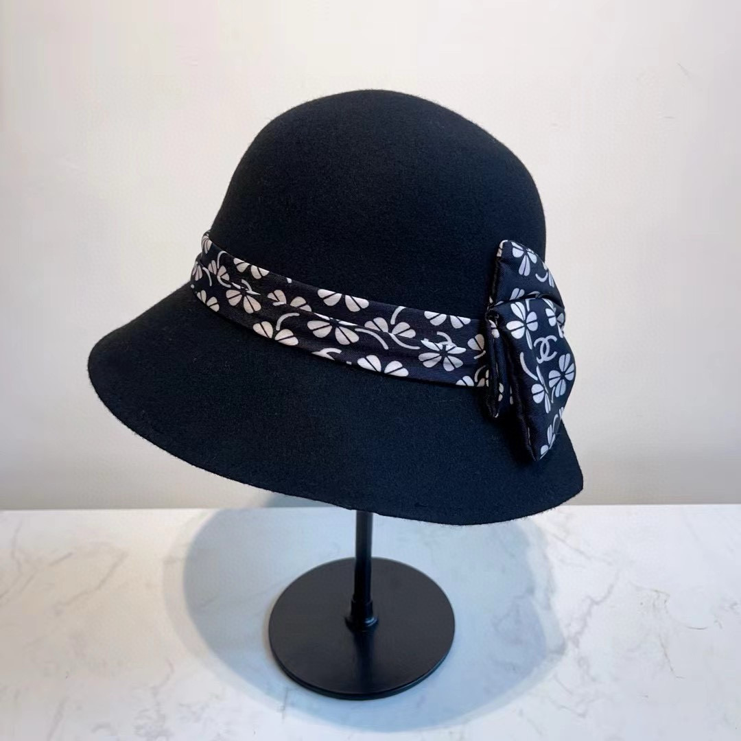 Model wearing Chanel wool bucket hat