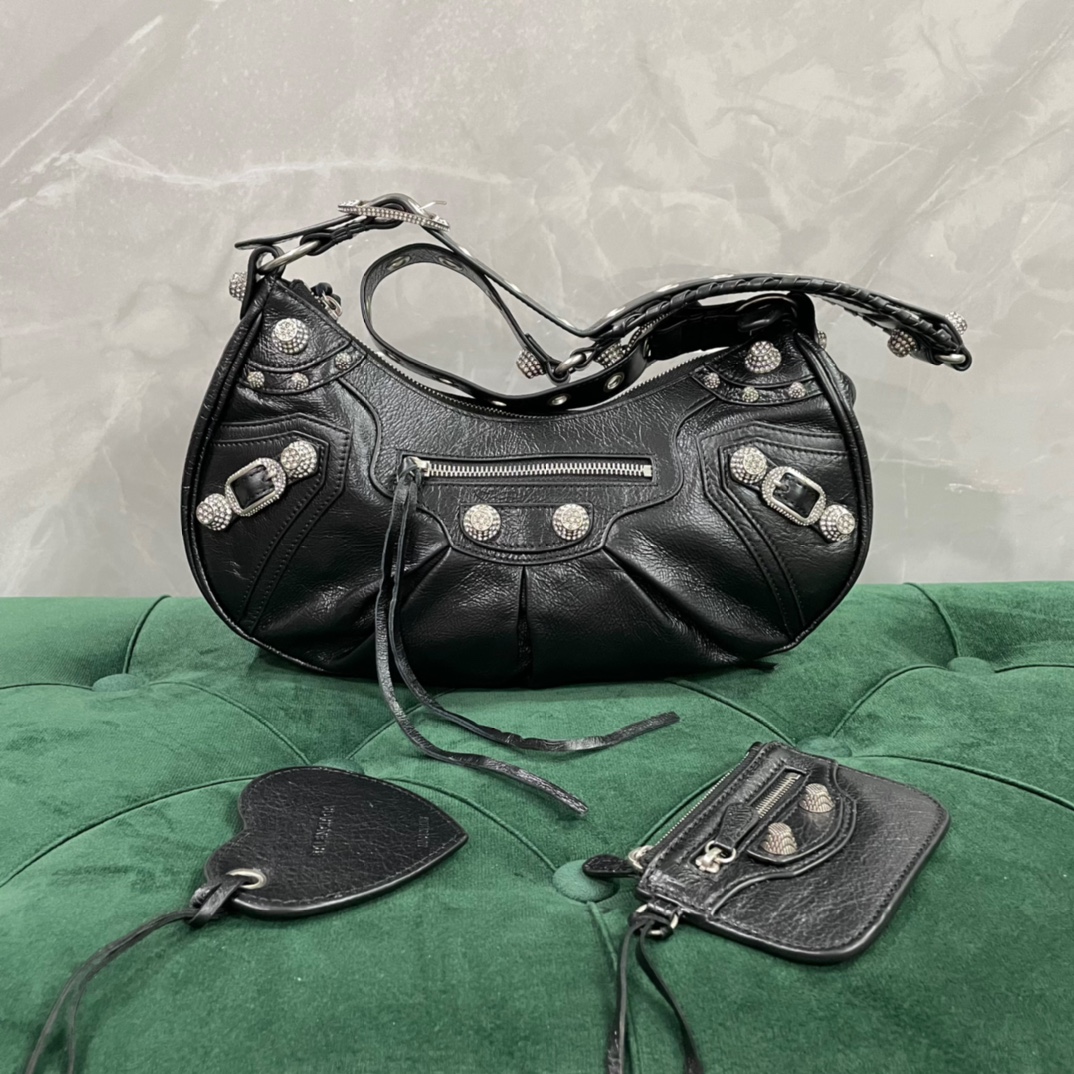 Online-Verkäufe
 Balenciaga Le Cagole Taschen Umhängetaschen  & Schultertaschen Schwarz Weben Schaffell Vintage Unterarm