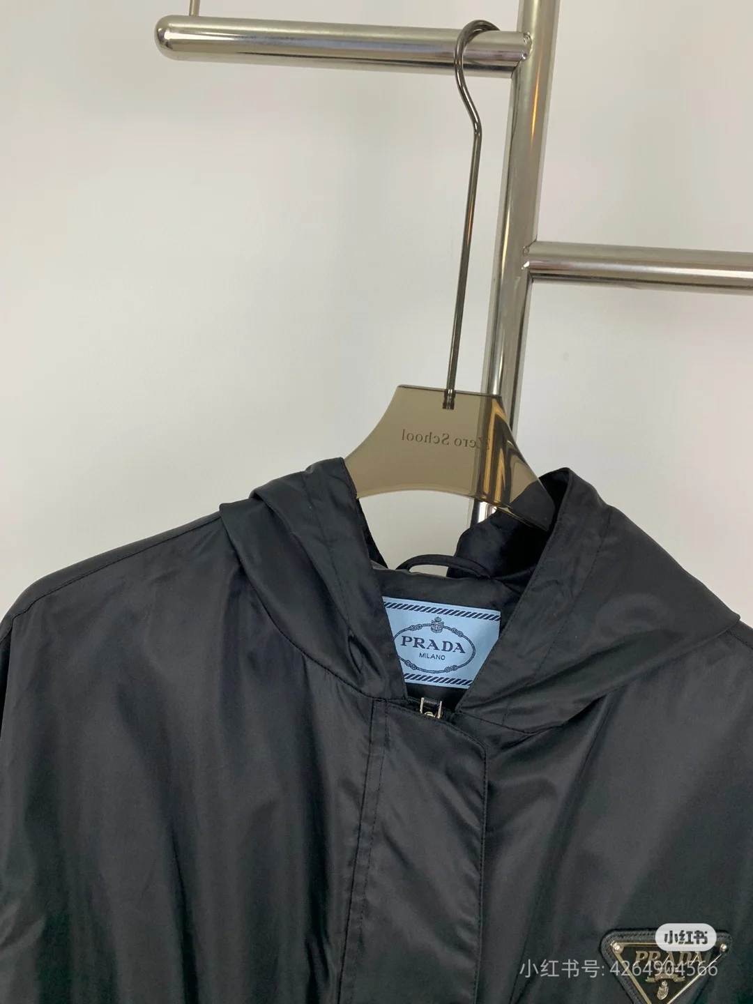 Top Prada long waist windbreaker jacket. Sizes: S, M, L.-Big cat