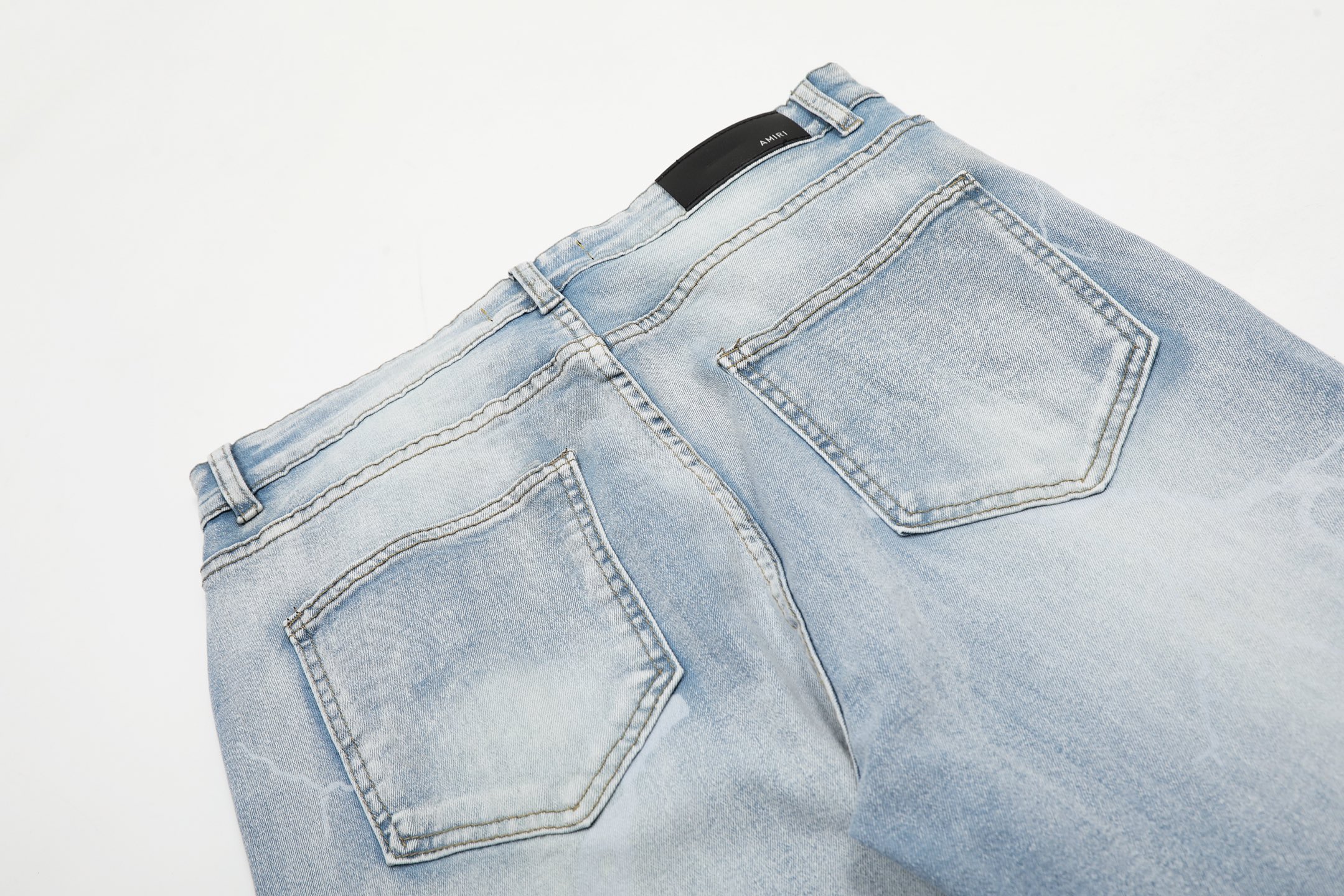 AMIRI Embroidered Jeans and Pants: Soft, Comfortable, Hand-Coded Custom Logo Buttons - 图片 8