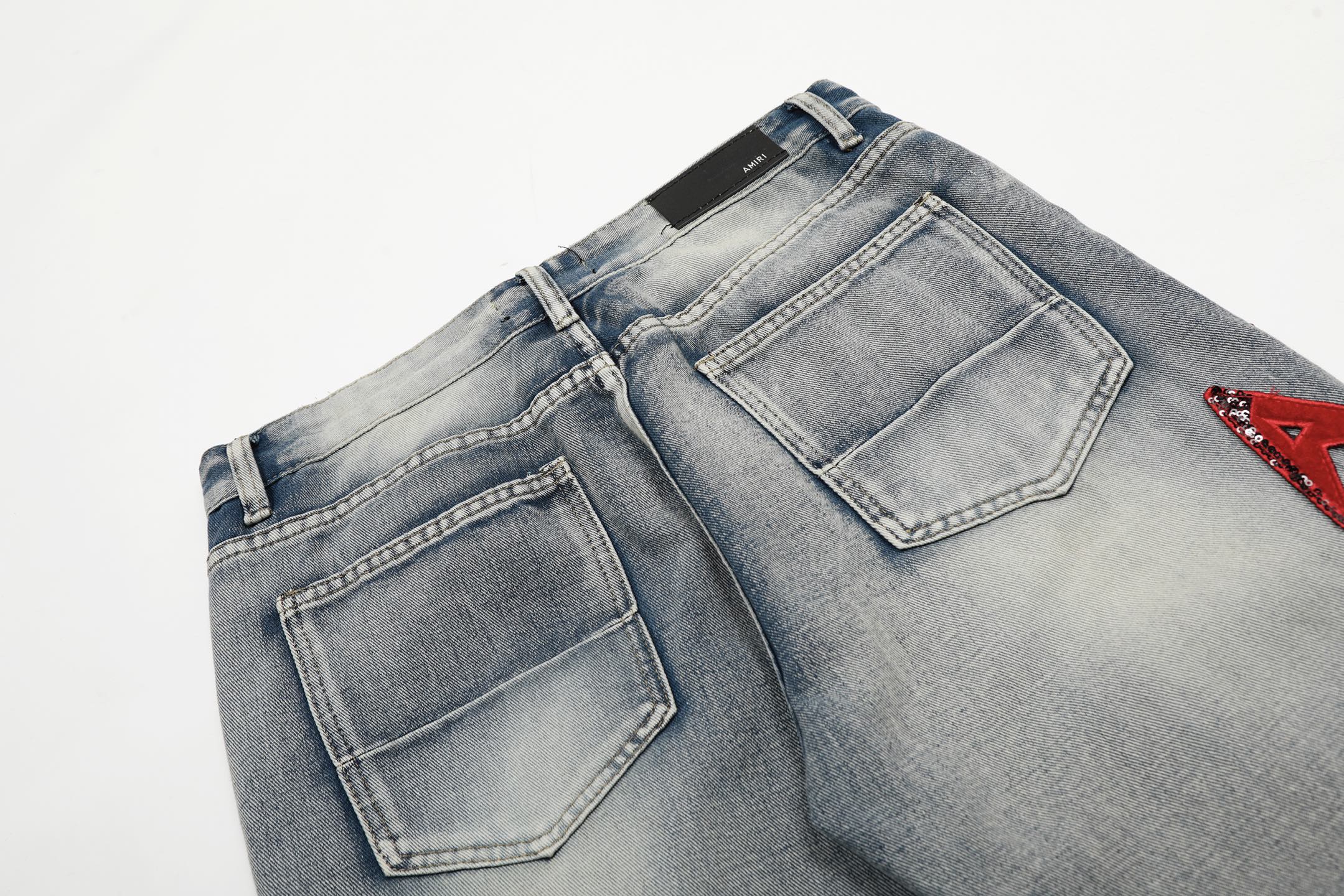 AMIRI Embroidered Jeans and Pants: Soft, Comfortable Tailored Denim with Custom Logo Buttons - 图片 7