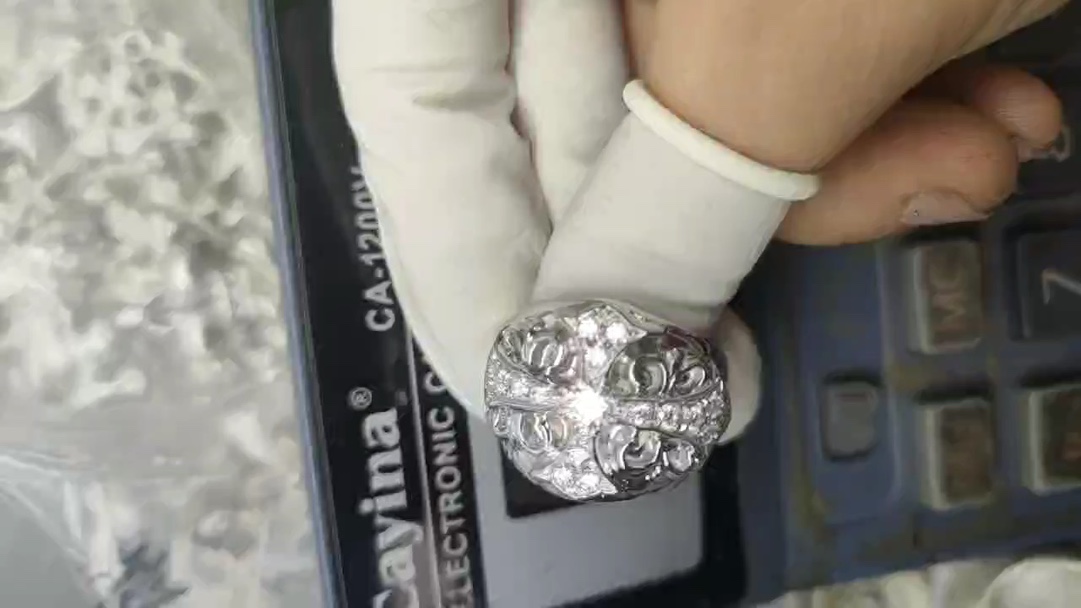 Production process: ring, custom gold-plated and diamond-set.