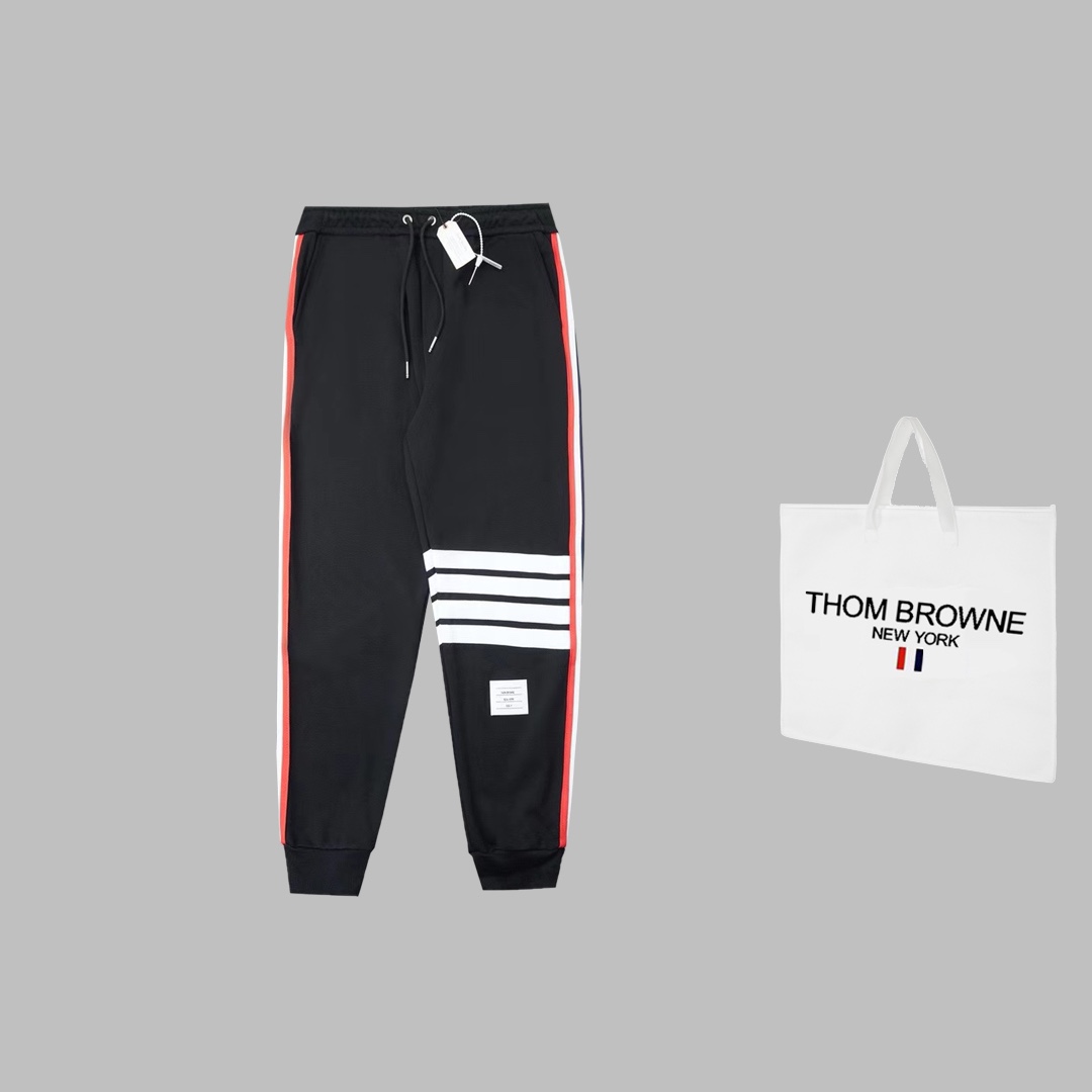 Luxury Handbags: Thom Browne Side-Banded Sweatpants with Unique Design