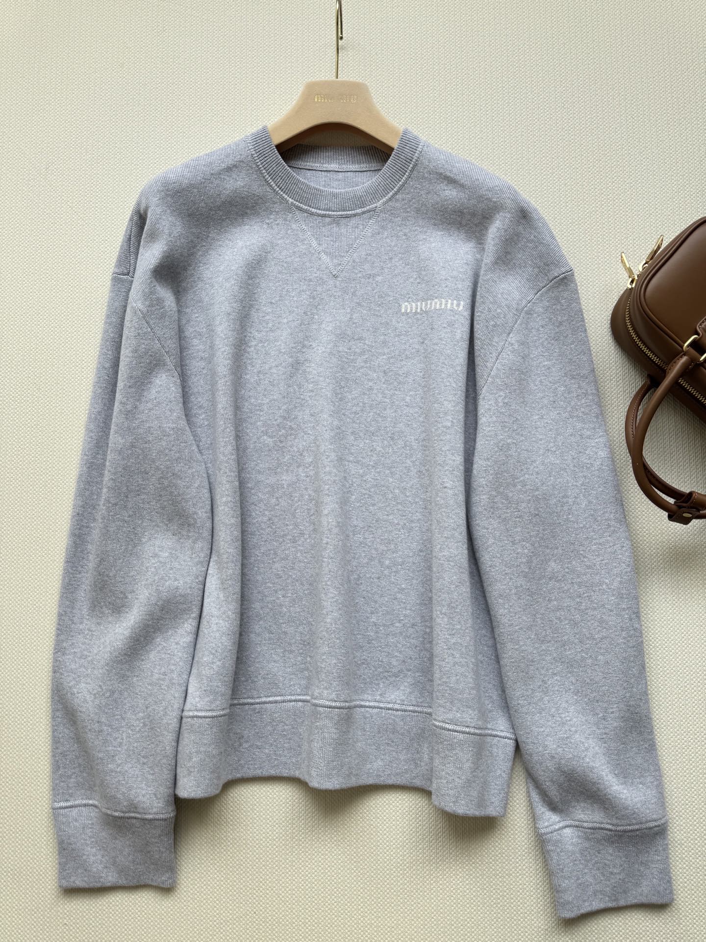 Miu Miu Cotton Fleece Sweatshirt with Embroidered Logo 4 i1751171677504 625 0 2