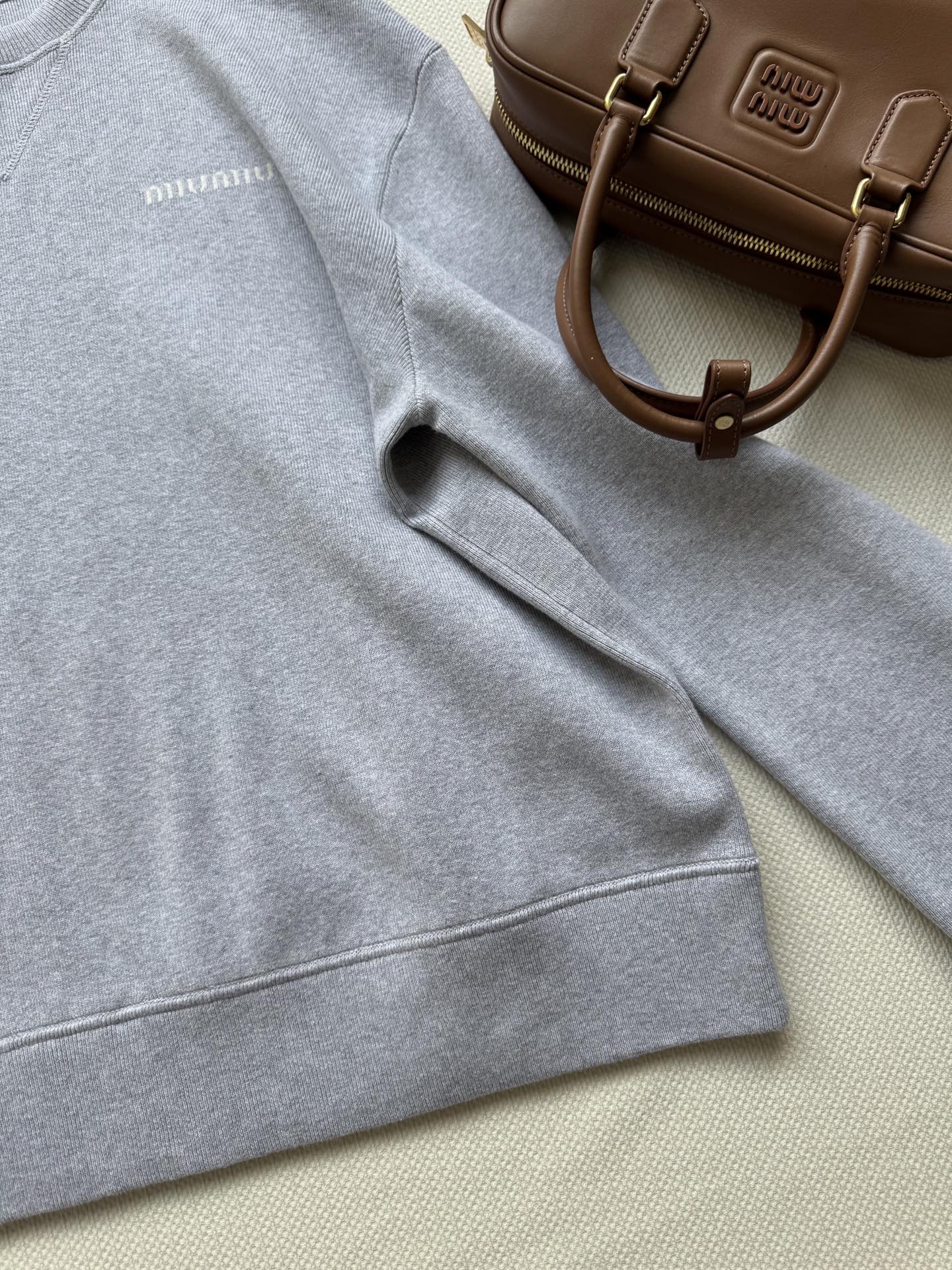 Miu Miu Cotton Fleece Sweatshirt with Embroidered Logo 6 i1751171677504 6964 0 1