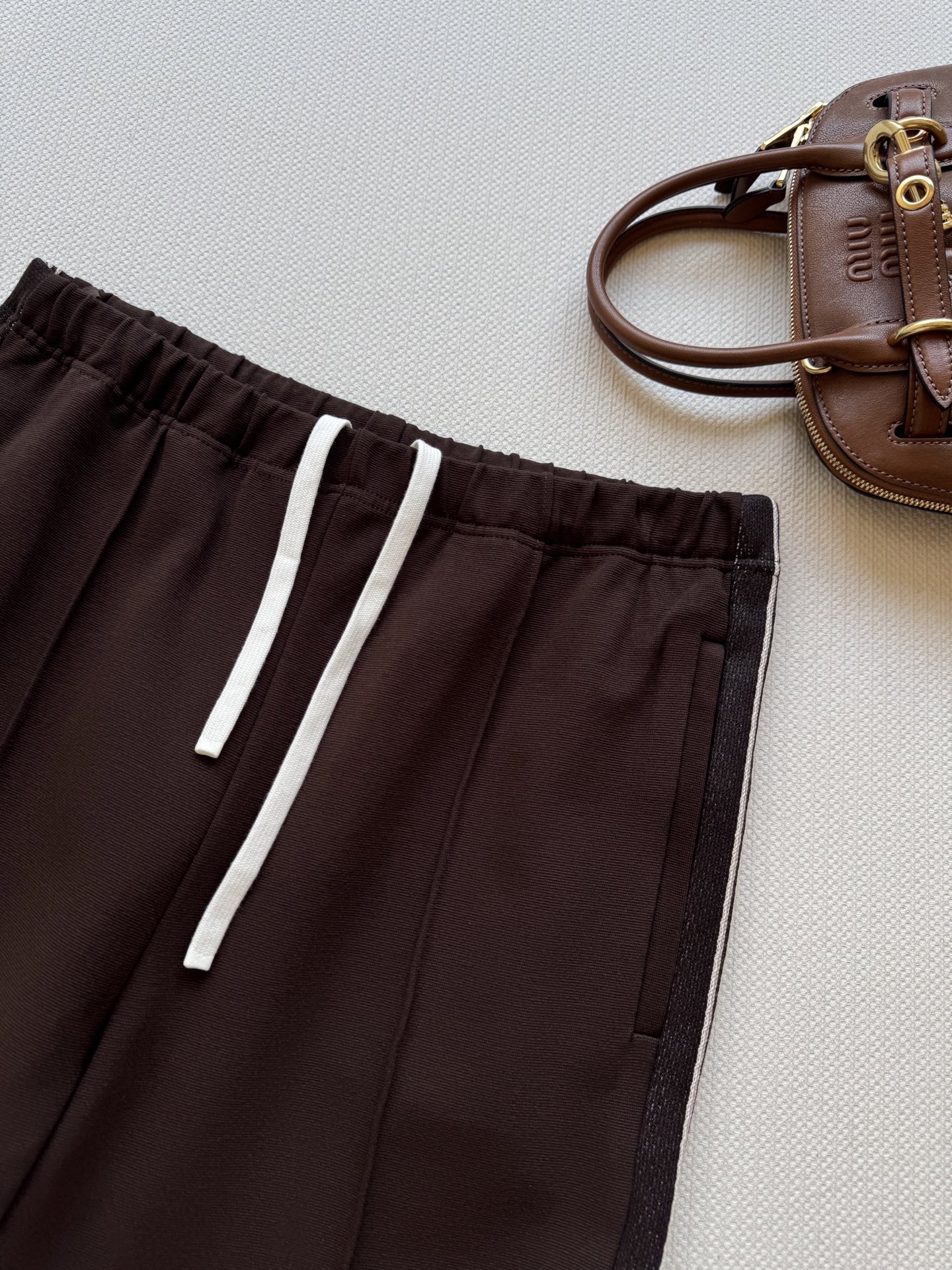 Miumi* 25Fw早秋新款休闲西裤丨原版开发！高版出品！美拉德色系设计上身特别好看 解锁不一样的穿搭