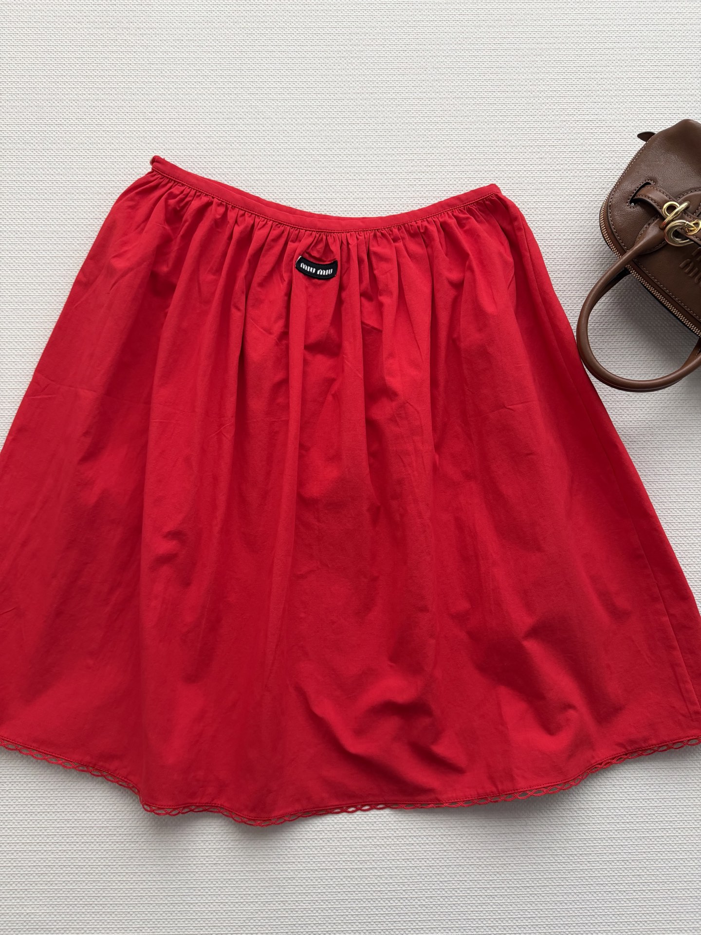 Miumi* 🆕26Ss春夏新款 知性分子学院风花边白色半裙。原版1:1定制花边开发！高版出品！定制进口