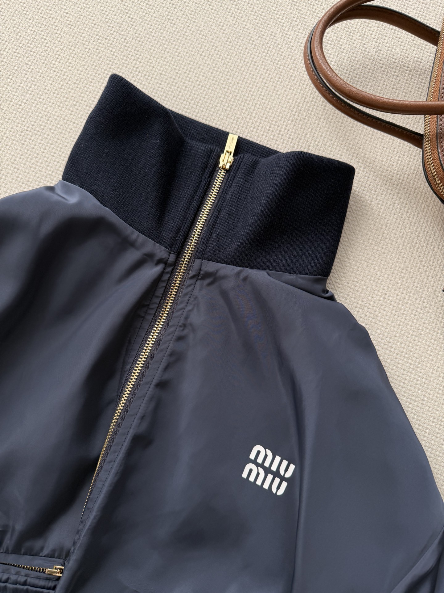 miumi*🆕26春夏新品 将学院风与运动风完美融合，标志性刺绣logo，自带品牌辨识度，甜酷感拉满 高