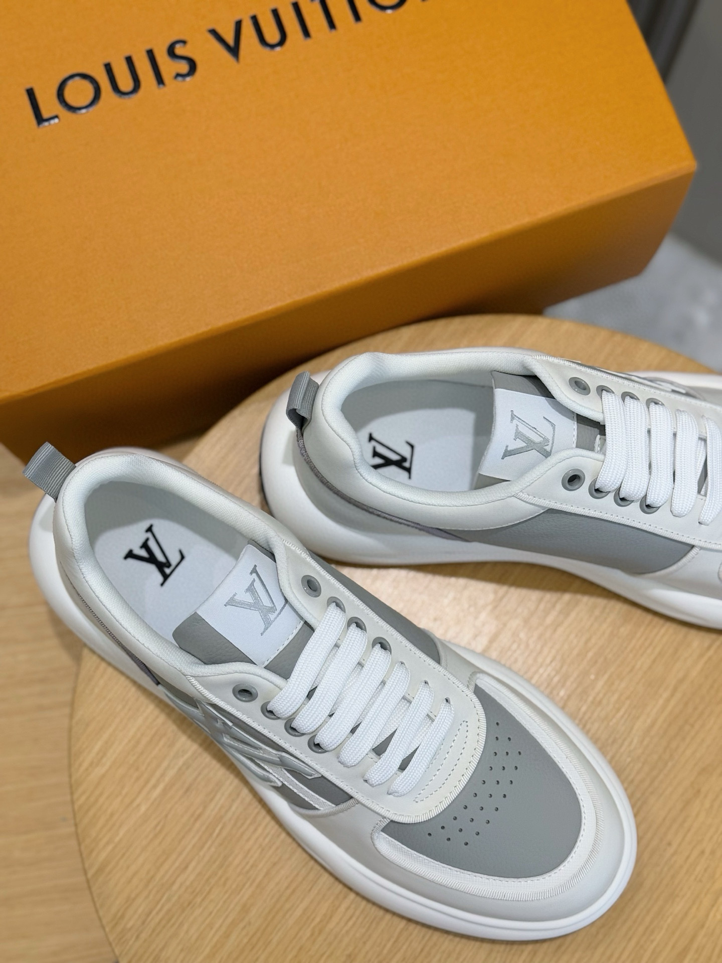 Louis Vuitton Men's Leather Sneakers: Soft Calfskin, Embossed Logo, Rubber Sole 9 i1756050534793 8692 0 7