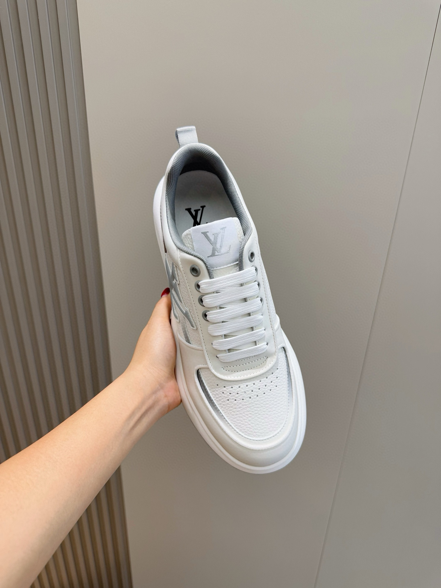 Louis Vuitton Men's Trainer: Supple Calf Leather, Embossed Logo, Lightweight Rubber Sole 5 i1756050656635 5987 0 3