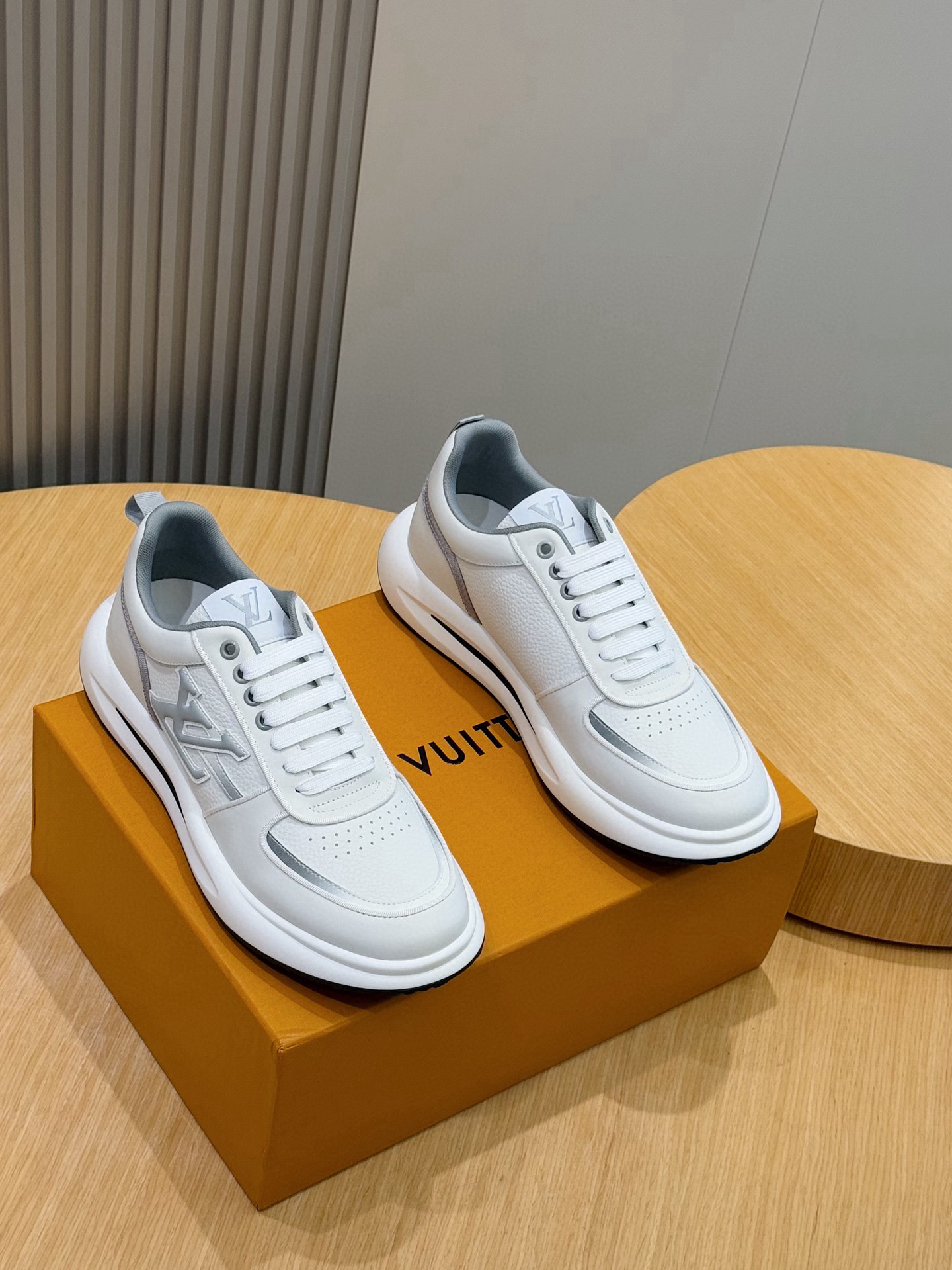 Louis Vuitton Men's Trainer: Supple Calf Leather, Embossed Logo, Lightweight Rubber Sole 2 i1756050656635 8977 0 0