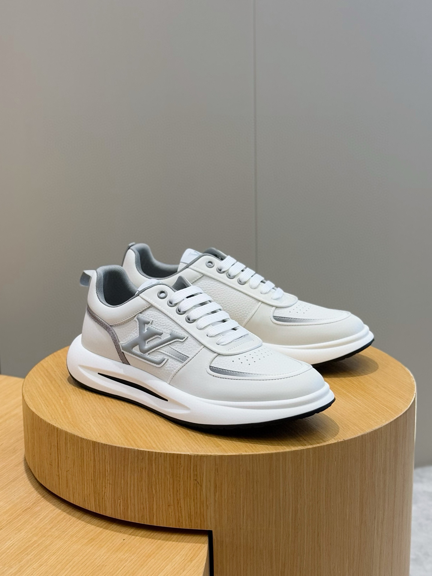 Louis Vuitton Men's Trainer: Supple Calf Leather, Embossed Logo, Lightweight Rubber Sole 4 i1756050657053 6637 0 2