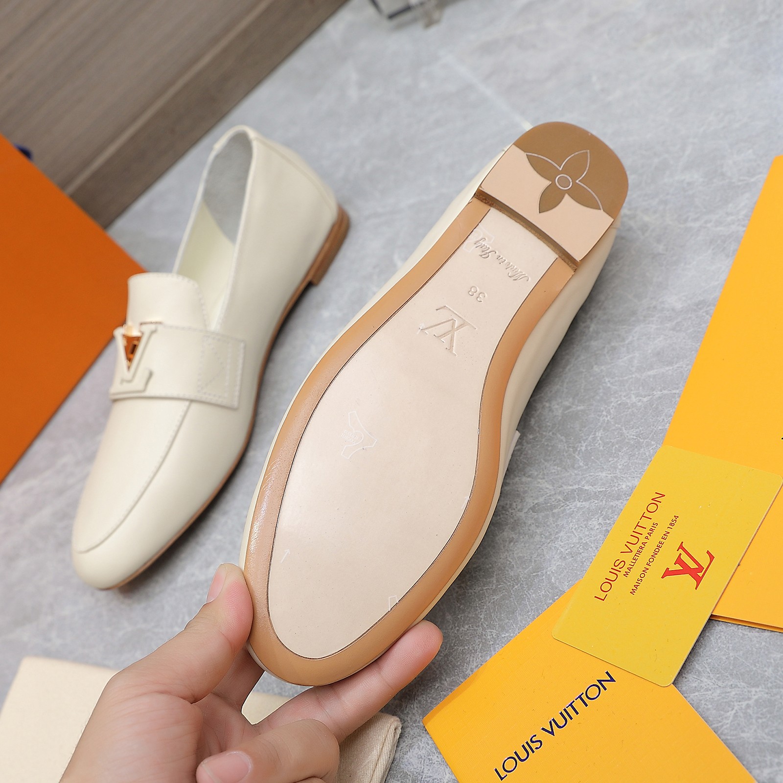 Louis Vuitton Women's Cream Leather Loafers with Signature Buckle Detail 5 a1705306194762 6561