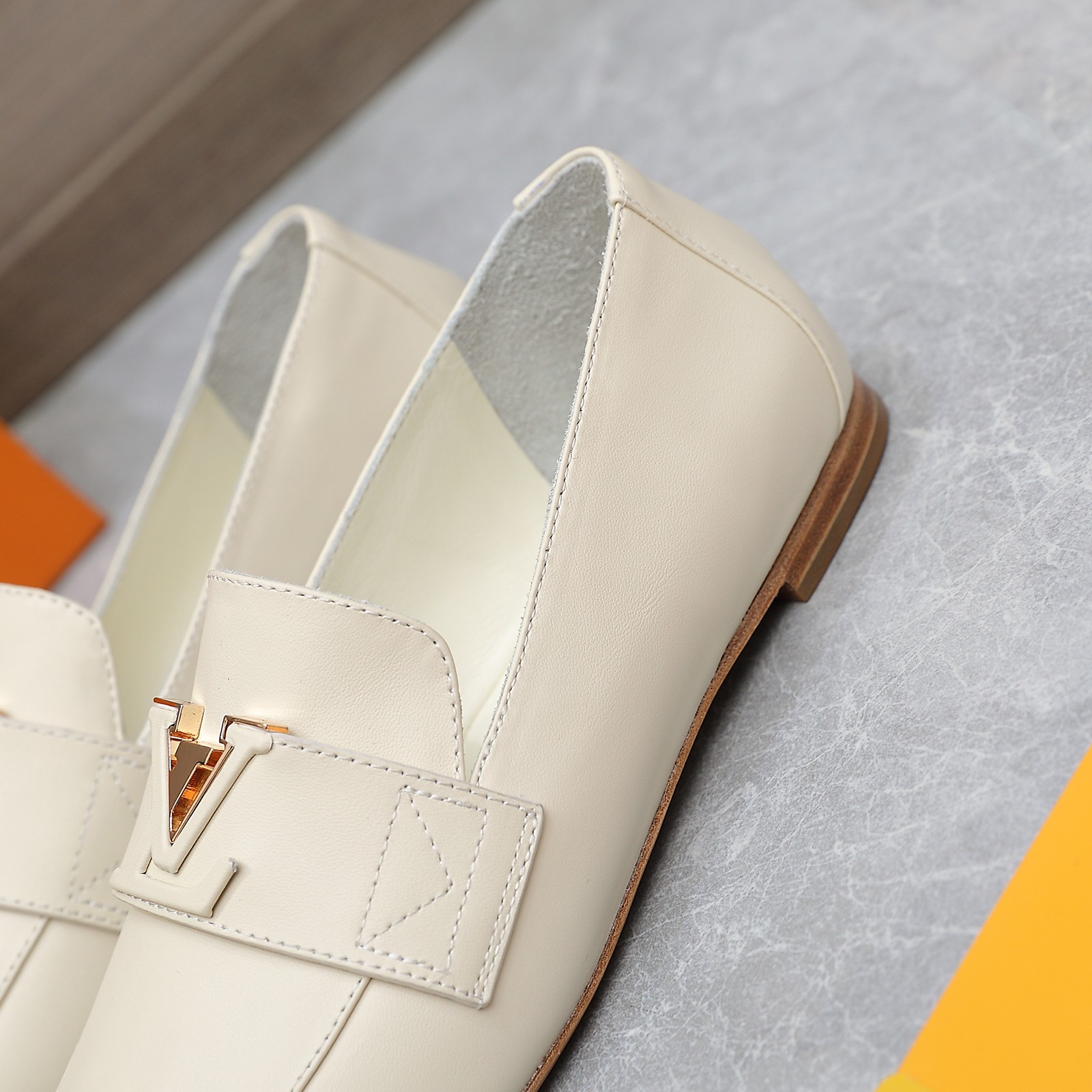 Louis Vuitton Women's Cream Leather Loafers with Signature Buckle Detail 8 a1705306195928 3462
