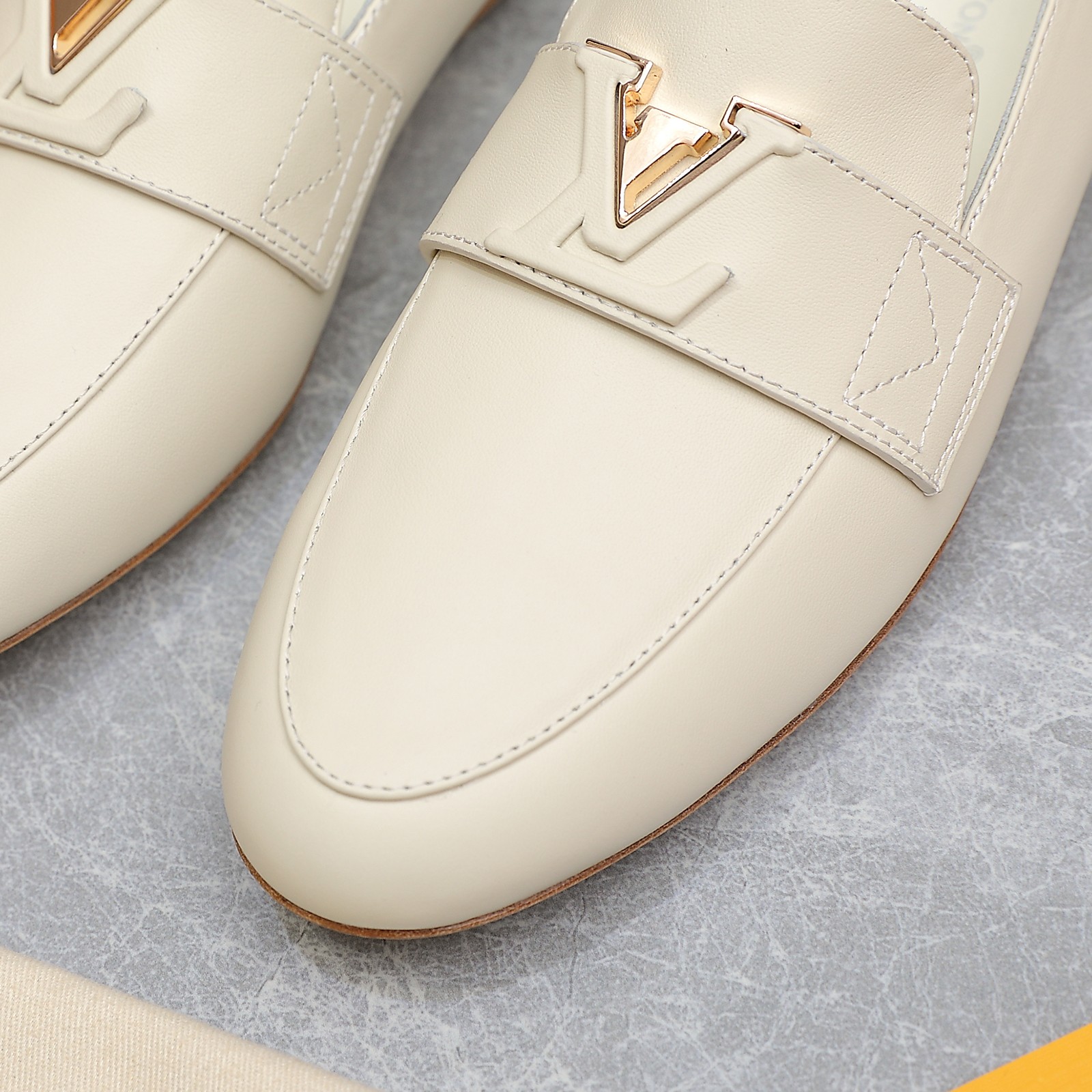 Louis Vuitton Women's Cream Leather Loafers with Signature Buckle Detail 9 a1705306195953 5847